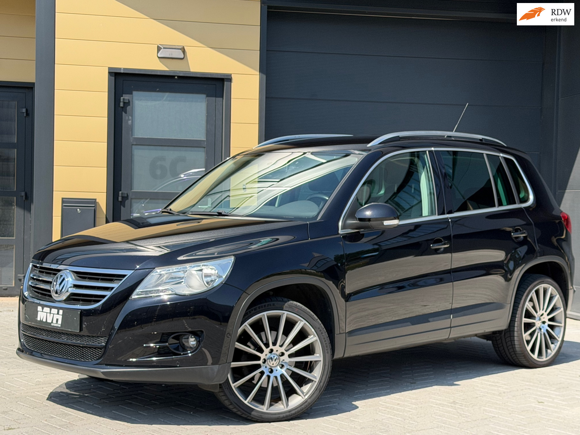 Volkswagen Tiguan 1.4 TSI Trend&Fun 4Motion - Cruise/Climate - 20 inch - PDC - 6BAK 2009 - voorkant