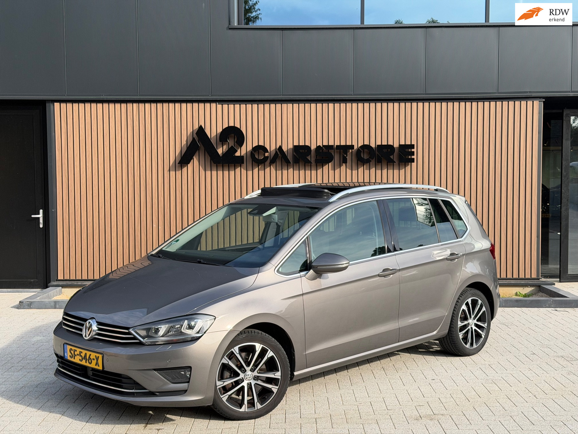Volkswagen Golf Sportsvan 1.4 TSI Highline DSG PANO TREKHAAK NETTE AUTO! 2014 - voorkant