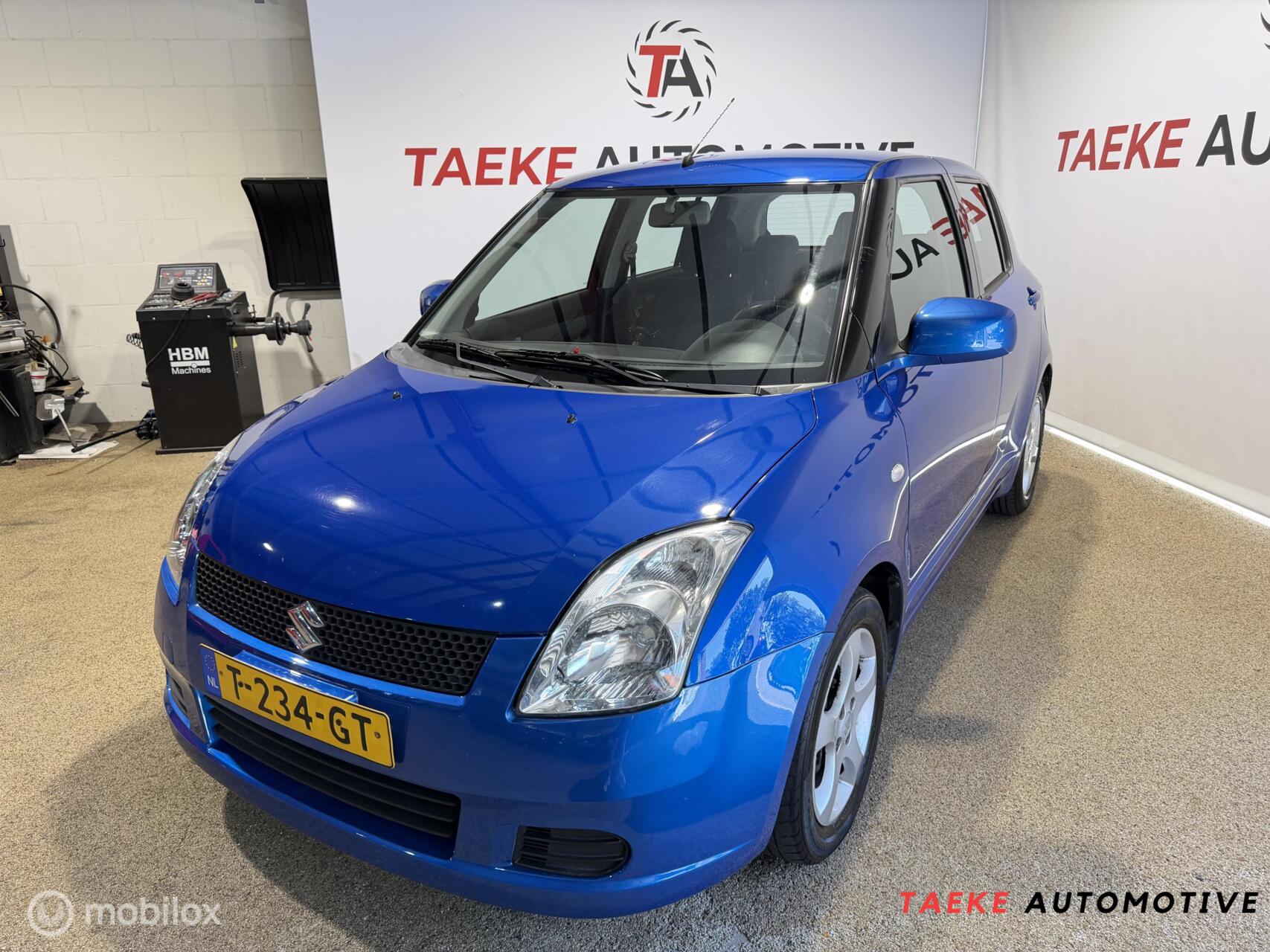 Suzuki Swift 1.3 Exclusive Automaat/Airco/Apk 2006 - voorkant