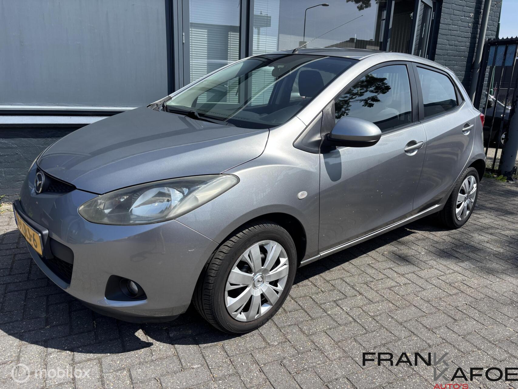 Mazda Mazda 2 1.3i XS Airco Elek.ramen V+A AUX CV Leder stuur 5drs 2010 - voorkant