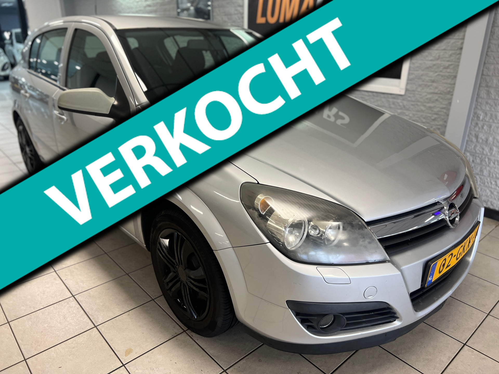 Opel Astra 1.6 Essentia | APK 2027 | Cruise | 5-deurs | Navi 2006 - voorkant