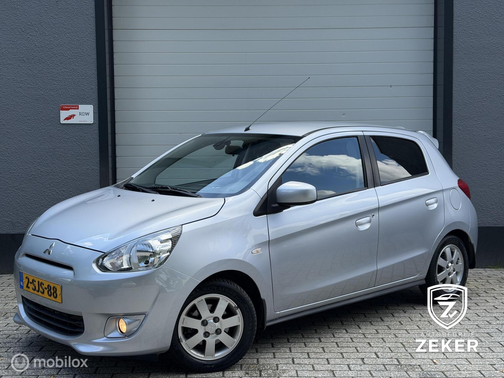 Mitsubishi Mitsubishi Space Star 1.2 / Automaat / Camera / Navigatie / 2013 - voorkant