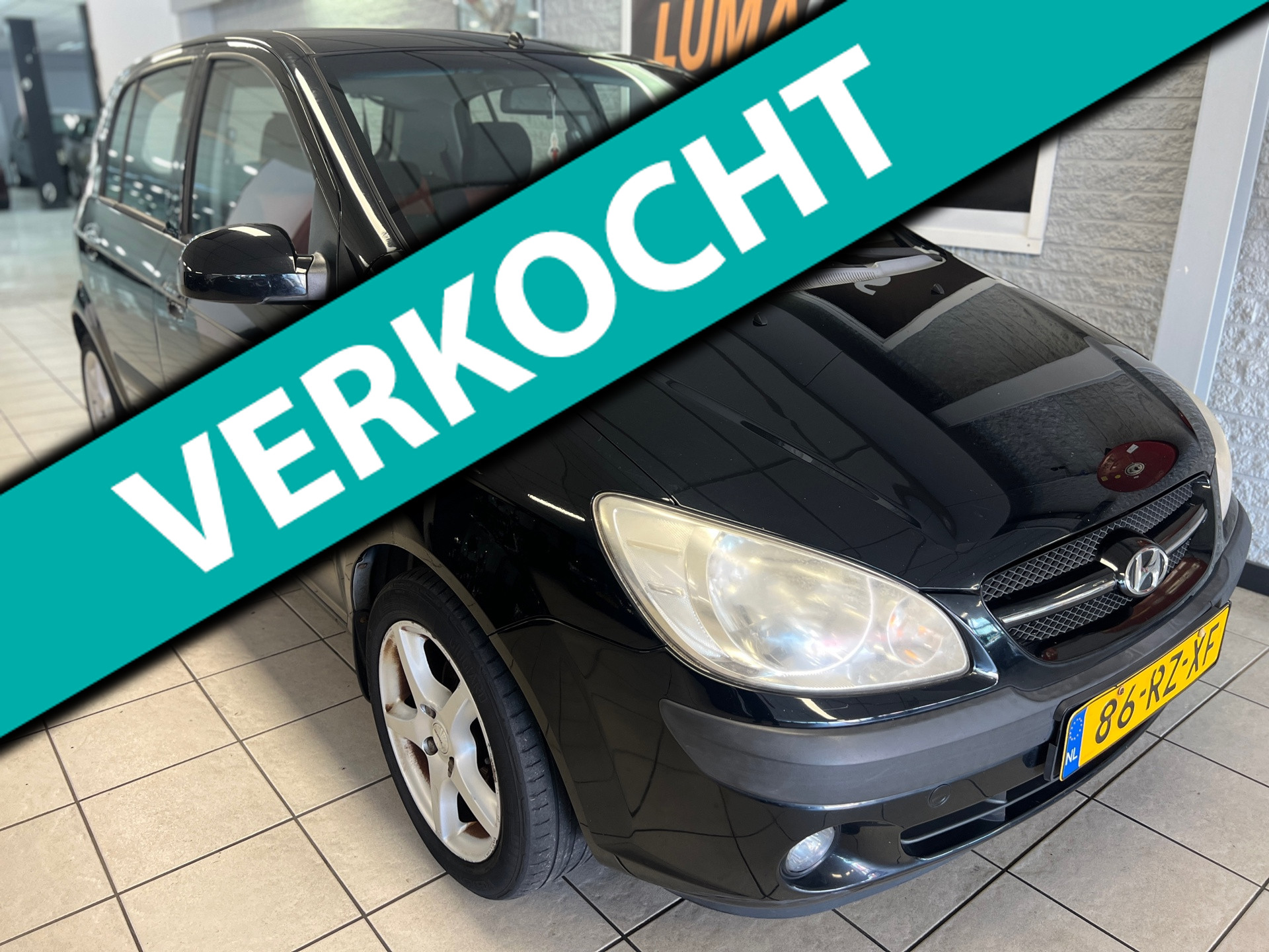 Hyundai Getz 1.4i First Edition | Airco | 5 deurs | Trekh. | 2005 - voorkant