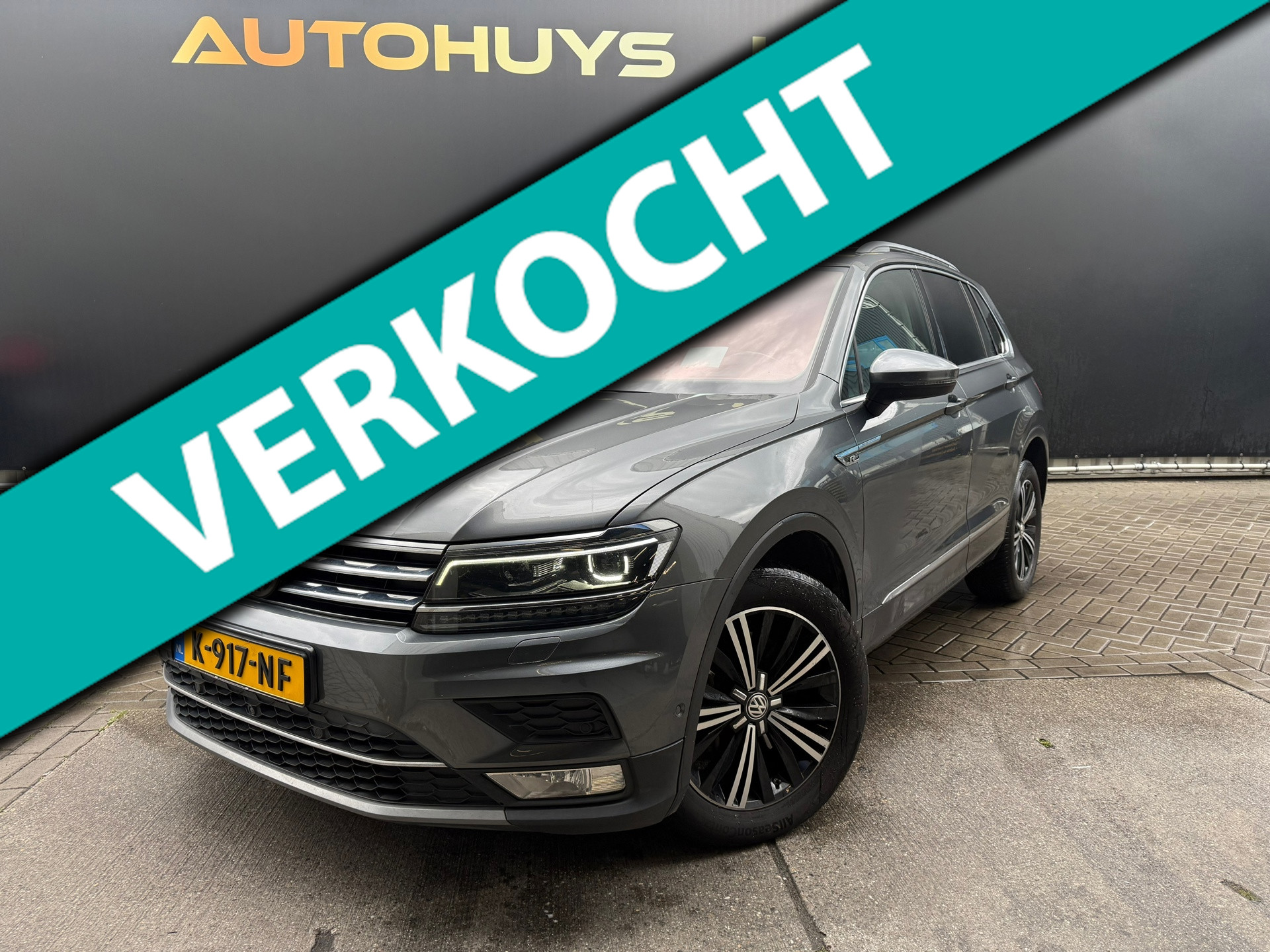 Volkswagen Tiguan 2.0 TSI 4Motion Highline Pano Leder H&U Memory Camera Carplay 2017 - voorkant
