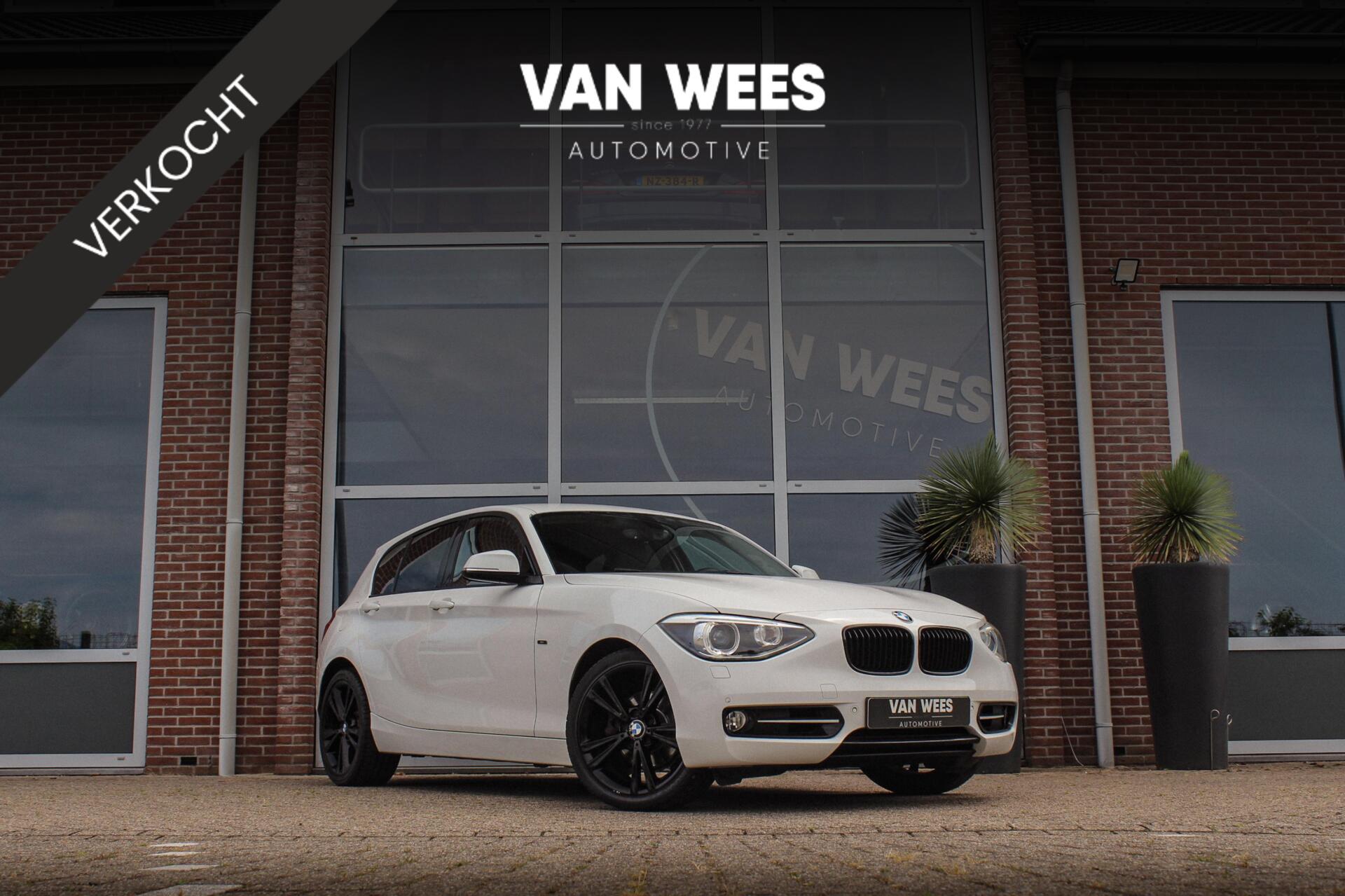 BMW 1er Reihe 118i Sport Line | Sportstuur | Stoelverwarming | Xenon adaptief | PDC | Climate control | Sportstoelen | Navigatie | Bluetooth | 18 inch | Lichtpakket | Leer | 18 inch 2012 - voorkant