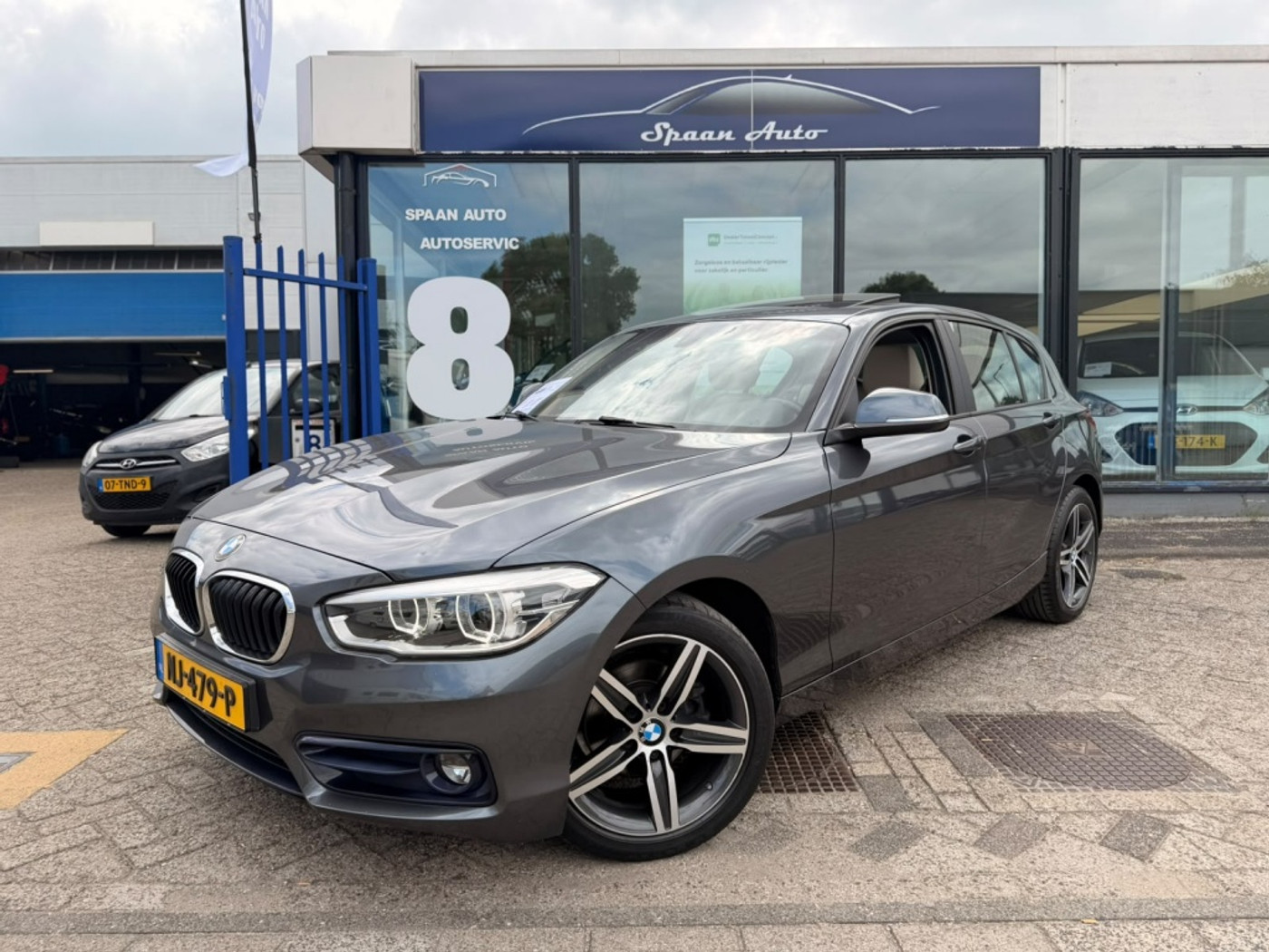 BMW 118i 118i Centennial High Executive | Automaat | Pano | Leer | carplay 2017 - voorkant