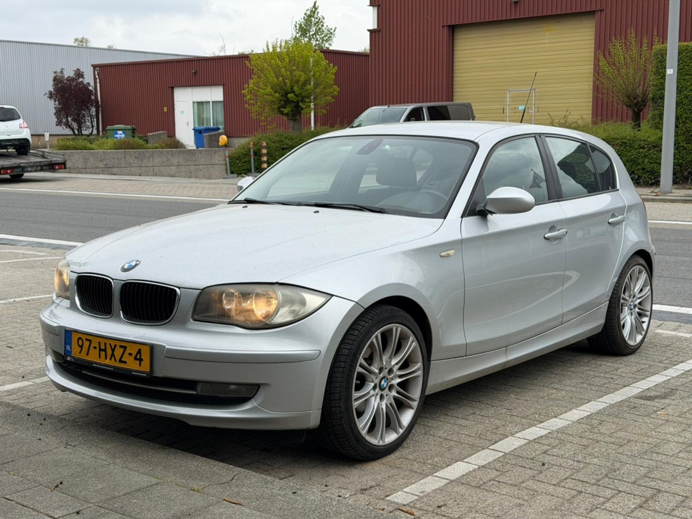 BMW 1er Reihe 116i 122PK Business Line 2009 - voorkant
