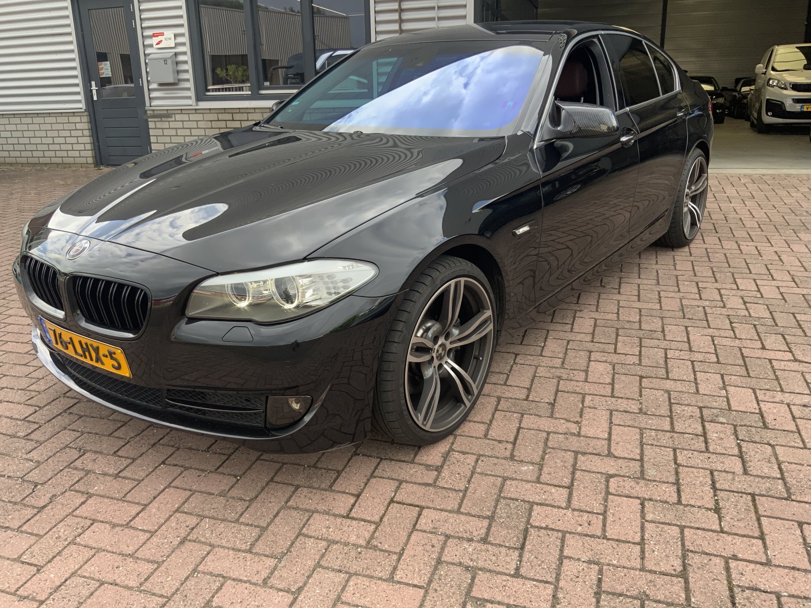 BMW 5-serie 528i High Executive 2010 - voorkant
