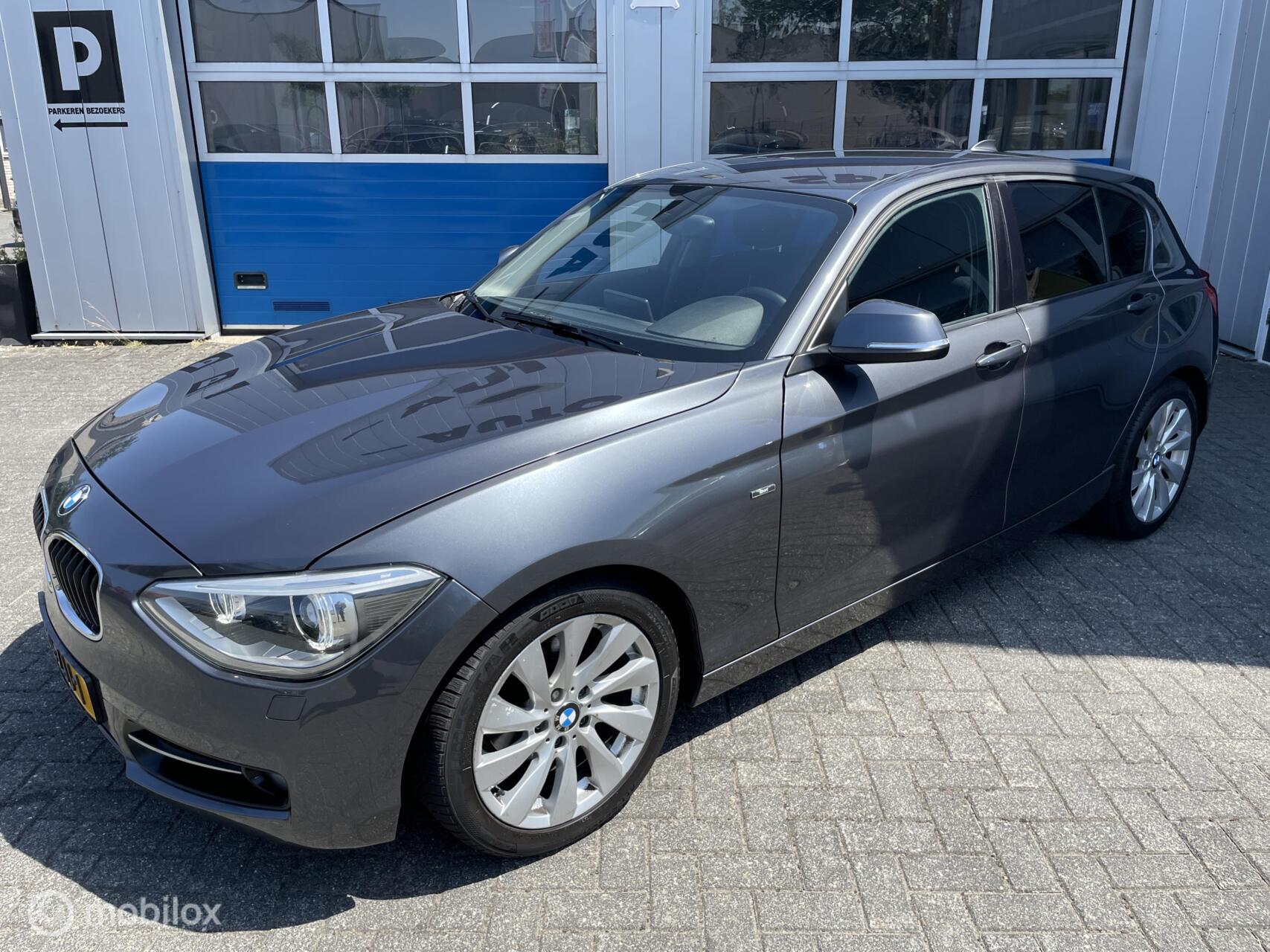 BMW 1-serie 116i Upgrade Edition 2012 - voorkant