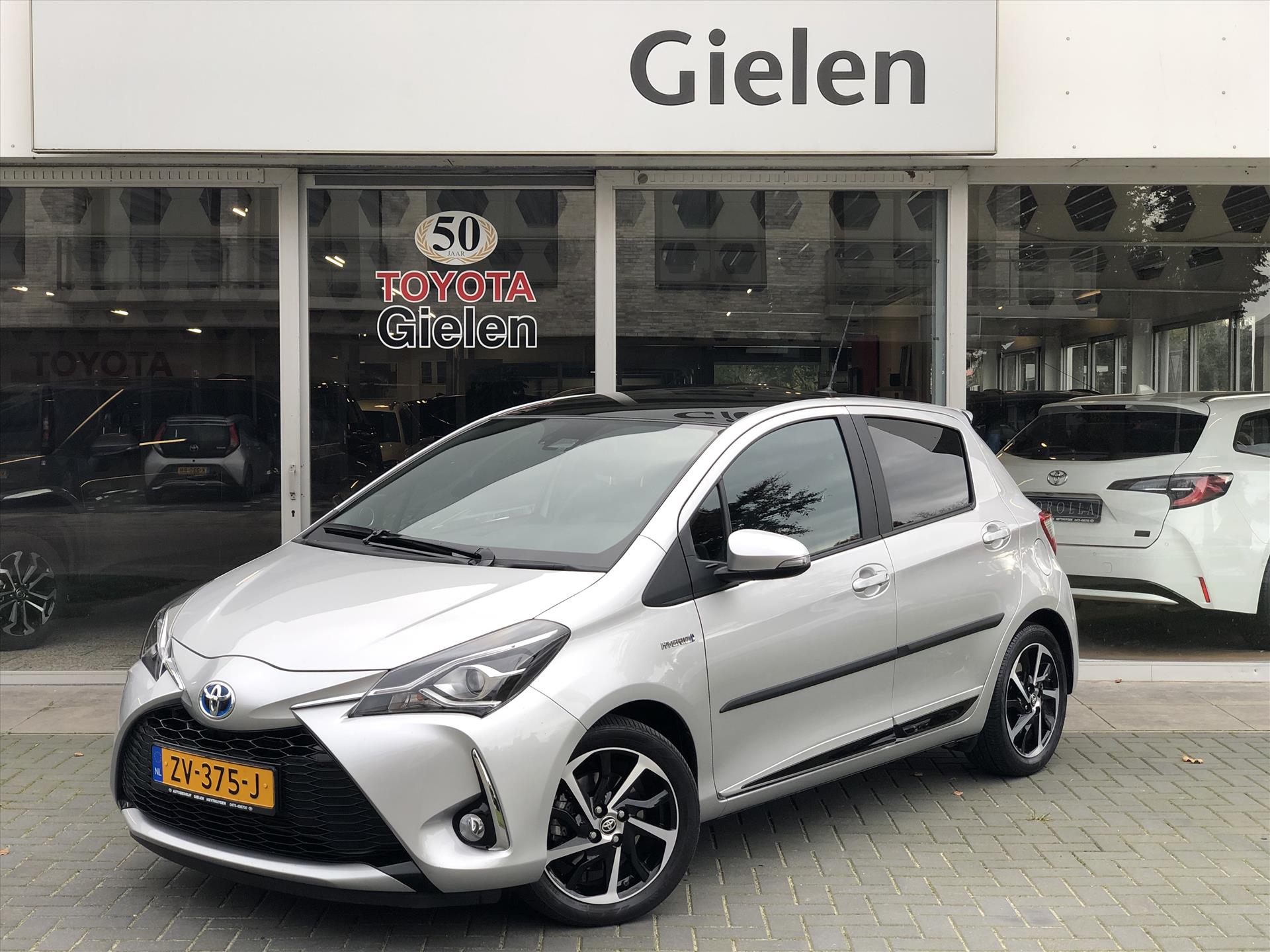 Toyota Toyota Yaris Hybrid 1.5 Hybrid Executive | Navigatie, Panoramadak, Leer/Alcantara, Armsteun, 16inch, Keyless, Meest Luxe! 2019 - voorkant