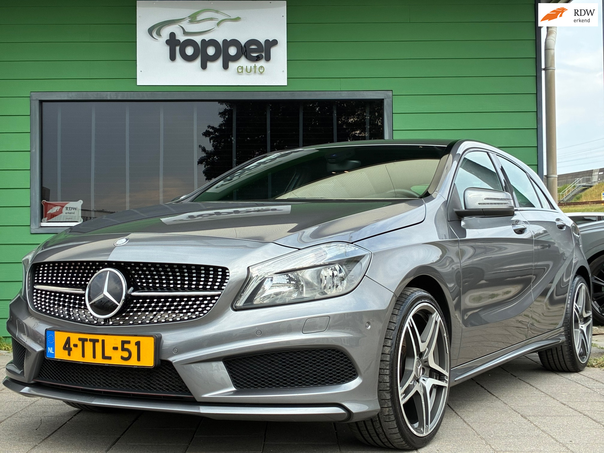 Mercedes-Benz A 180 180 Ambition|AMG|1e Eigenaar|Automaat|Navigatie|CruiseControl| 2013 - voorkant