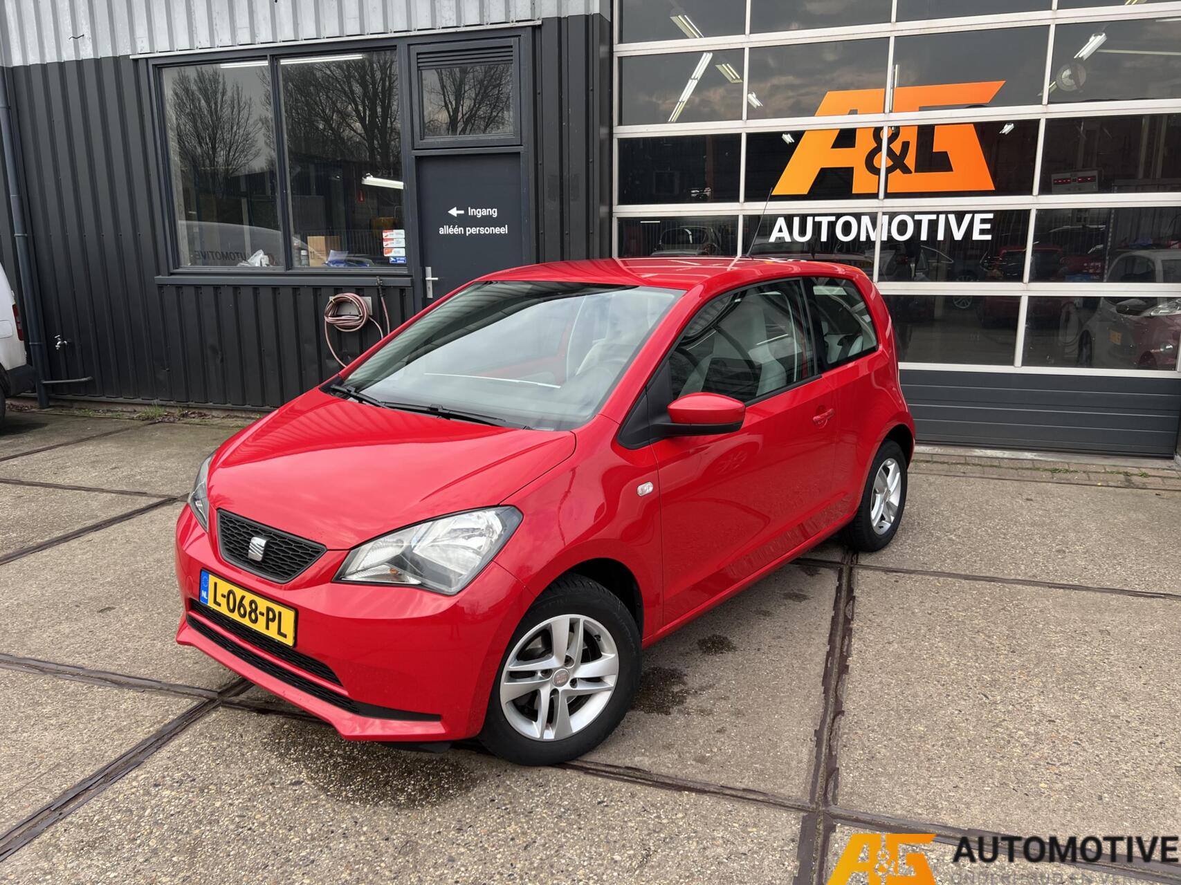 Seat Mii 1.0 2013 Rood | Airco | Cruise | PDC | 2013 - voorkant