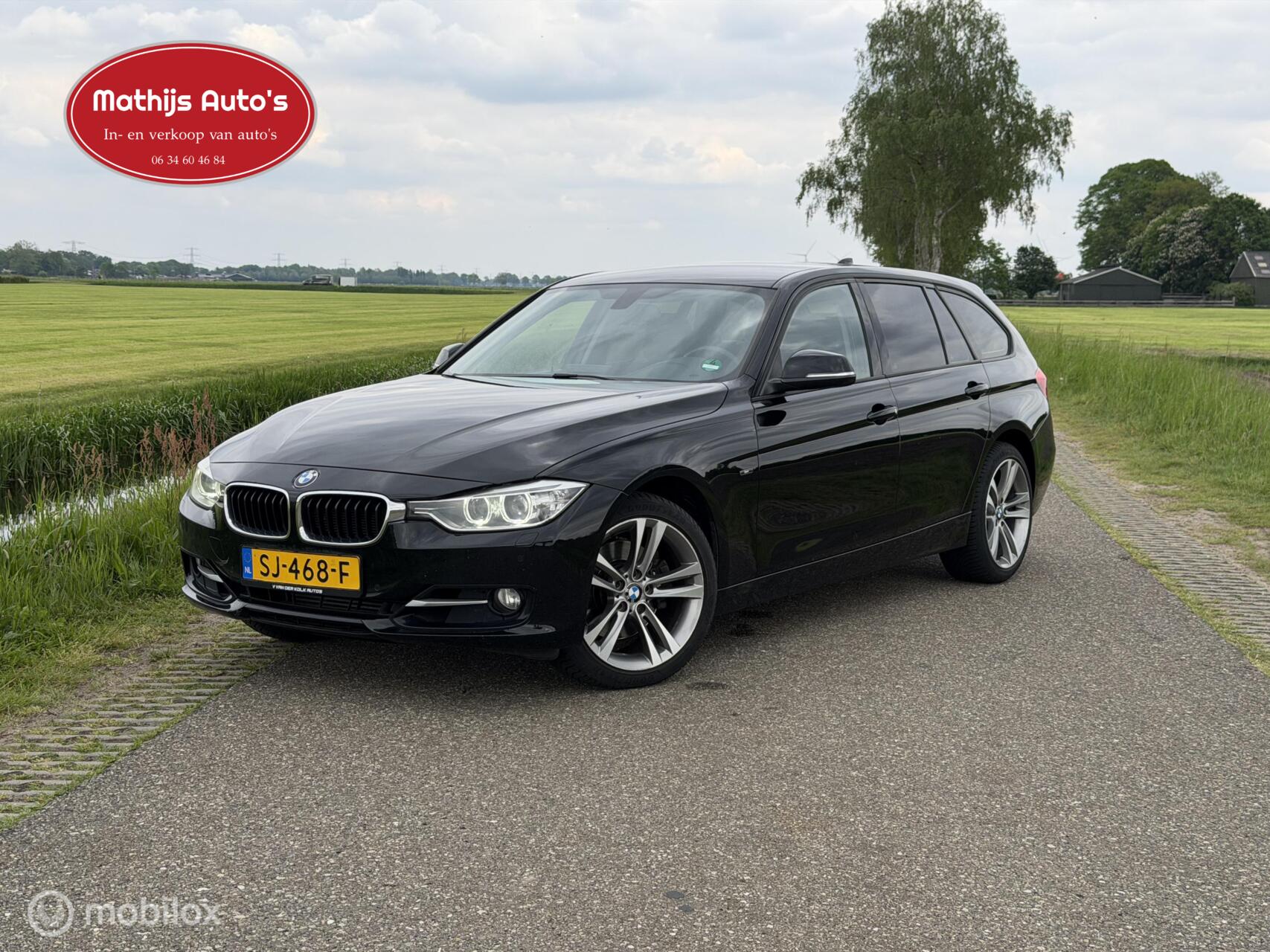 BMW 3-serie Touring 330d xDrive High Executive Automaat | Xenon | Leder | Navigatie | Cruise | Climate | Sensoren 2013 - voorkant