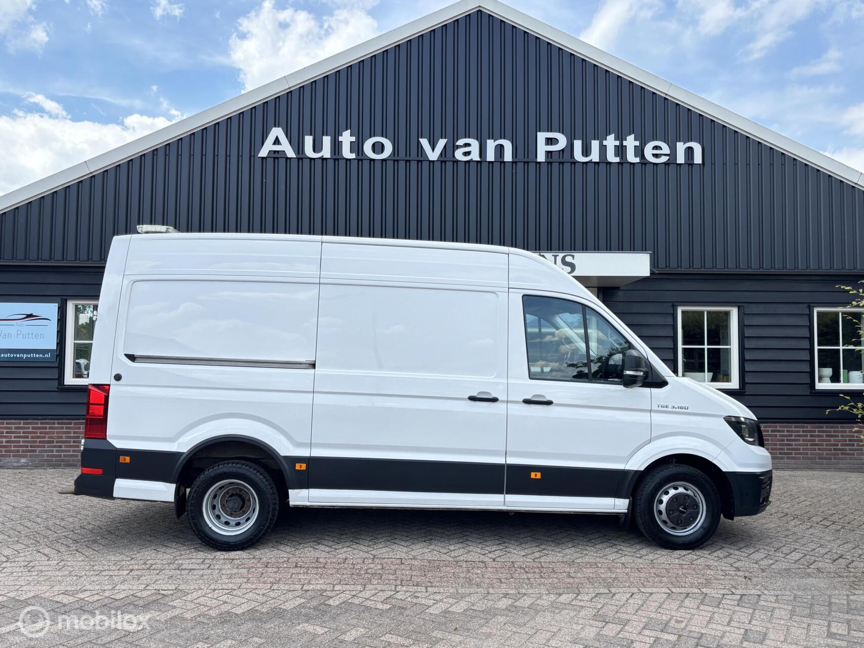 Foto van Man Tge