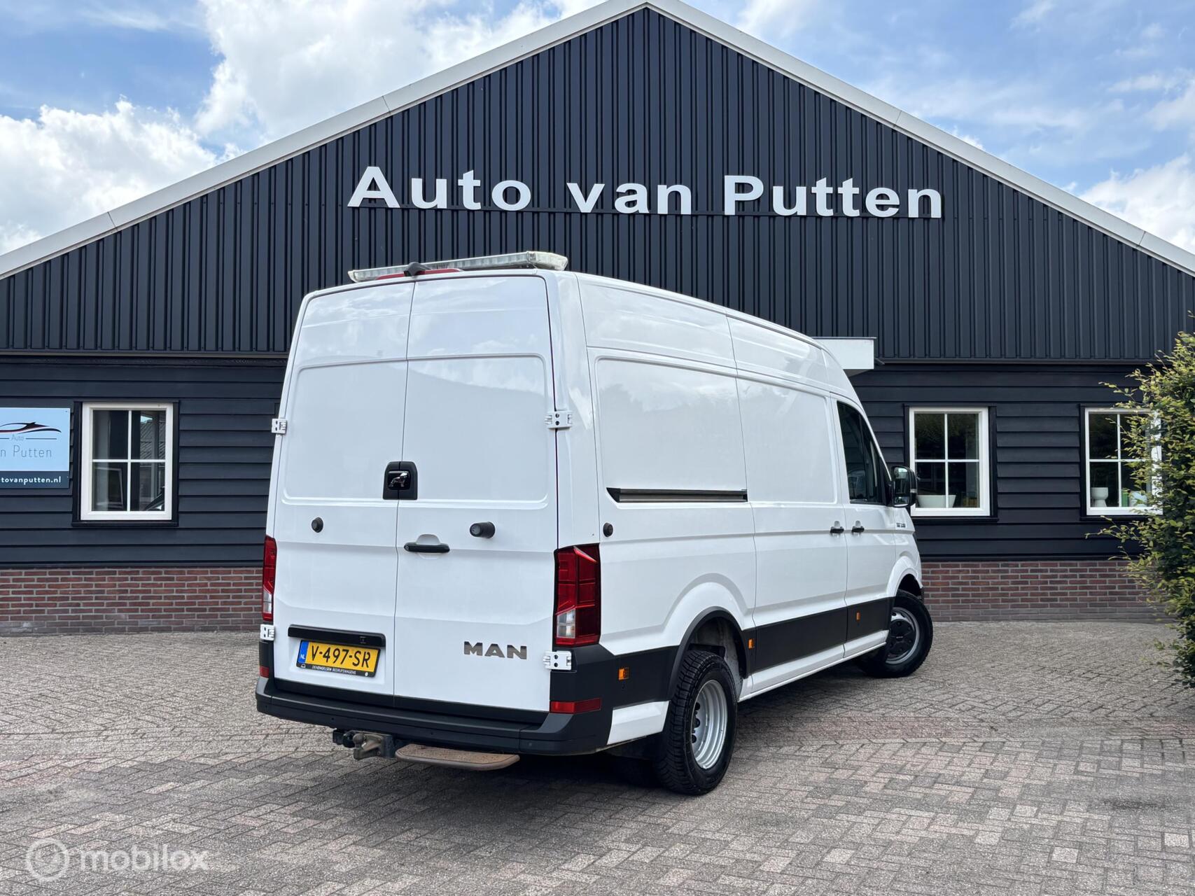 Foto van Man Tge