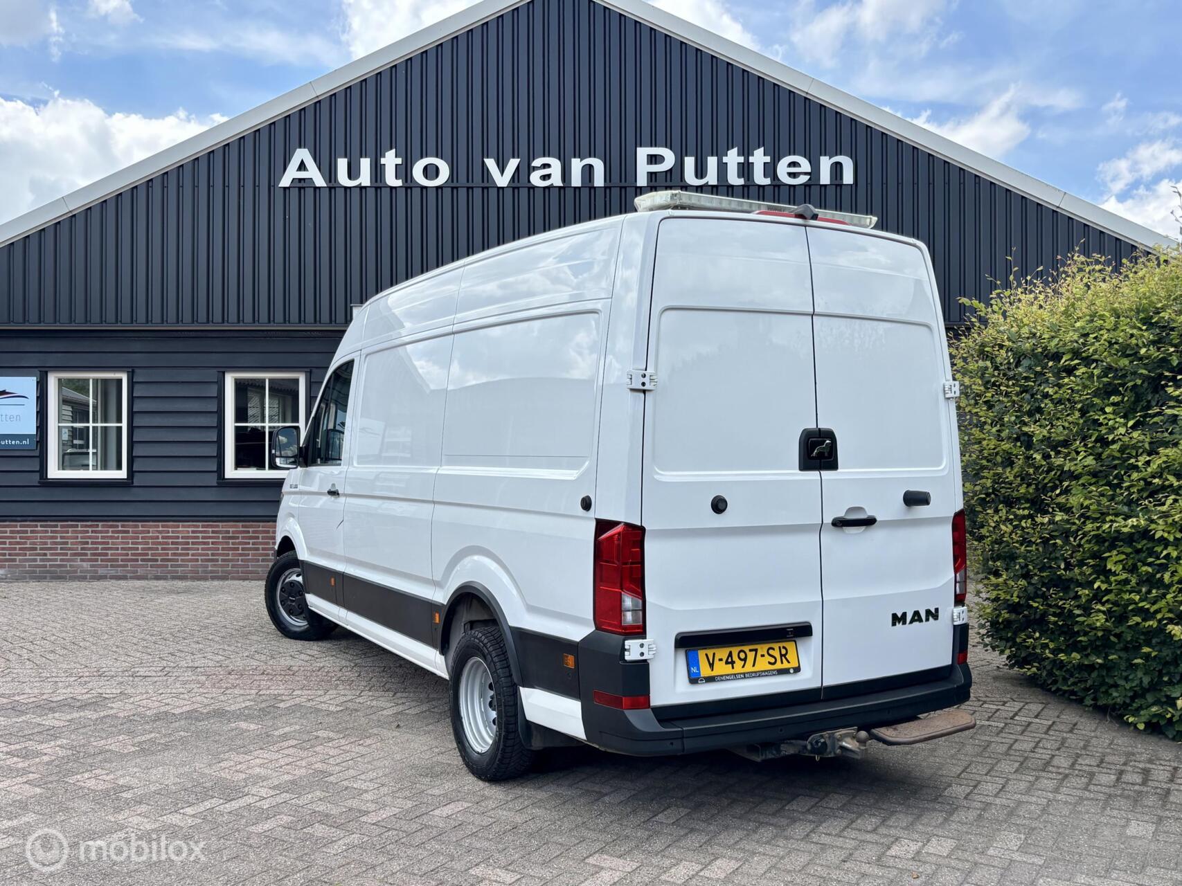 Foto van Man Tge