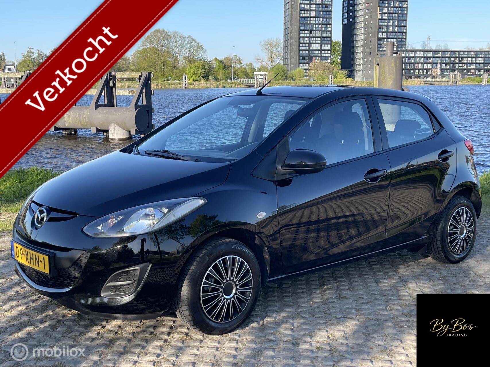Mazda Mazda 2 1.3 BIFUEL Cool 5-Drs Airco Trekhaak 2012 - voorkant