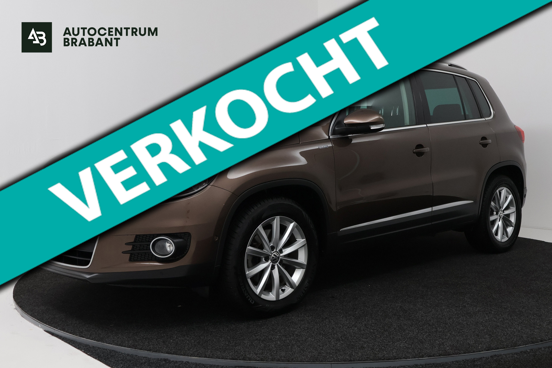 Volkswagen Tiguan 1.4 TSI Sport Edition (PANORAMADAK, CAMERA, PARKEERHULP, STUURBEDIENING,  MULTIMEDIA, PARKEERSENSOREN) 2015 - voorkant
