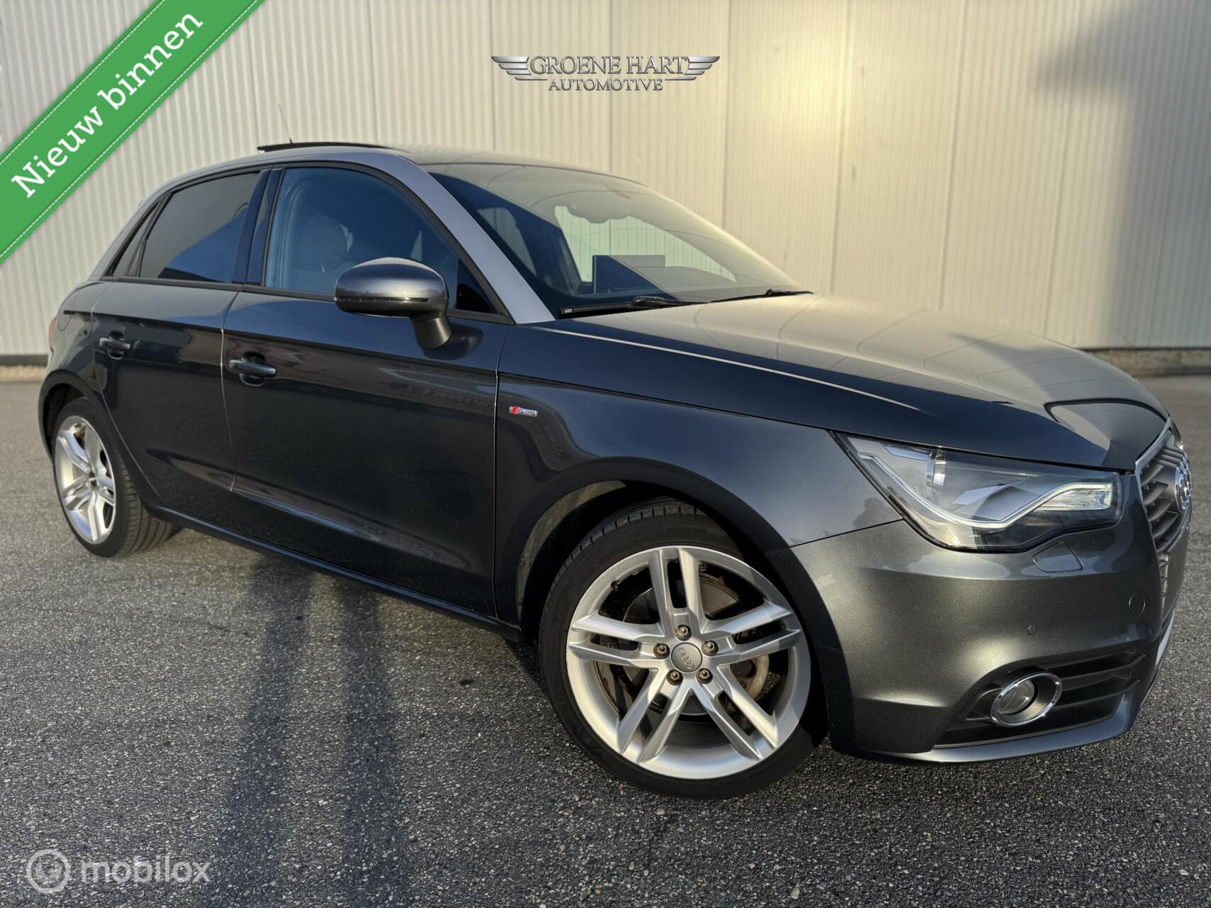 Audi A1 Sportback 1.4 TFSI 3x S-Line / APK / STOELVER / PANO 2014 - voorkant