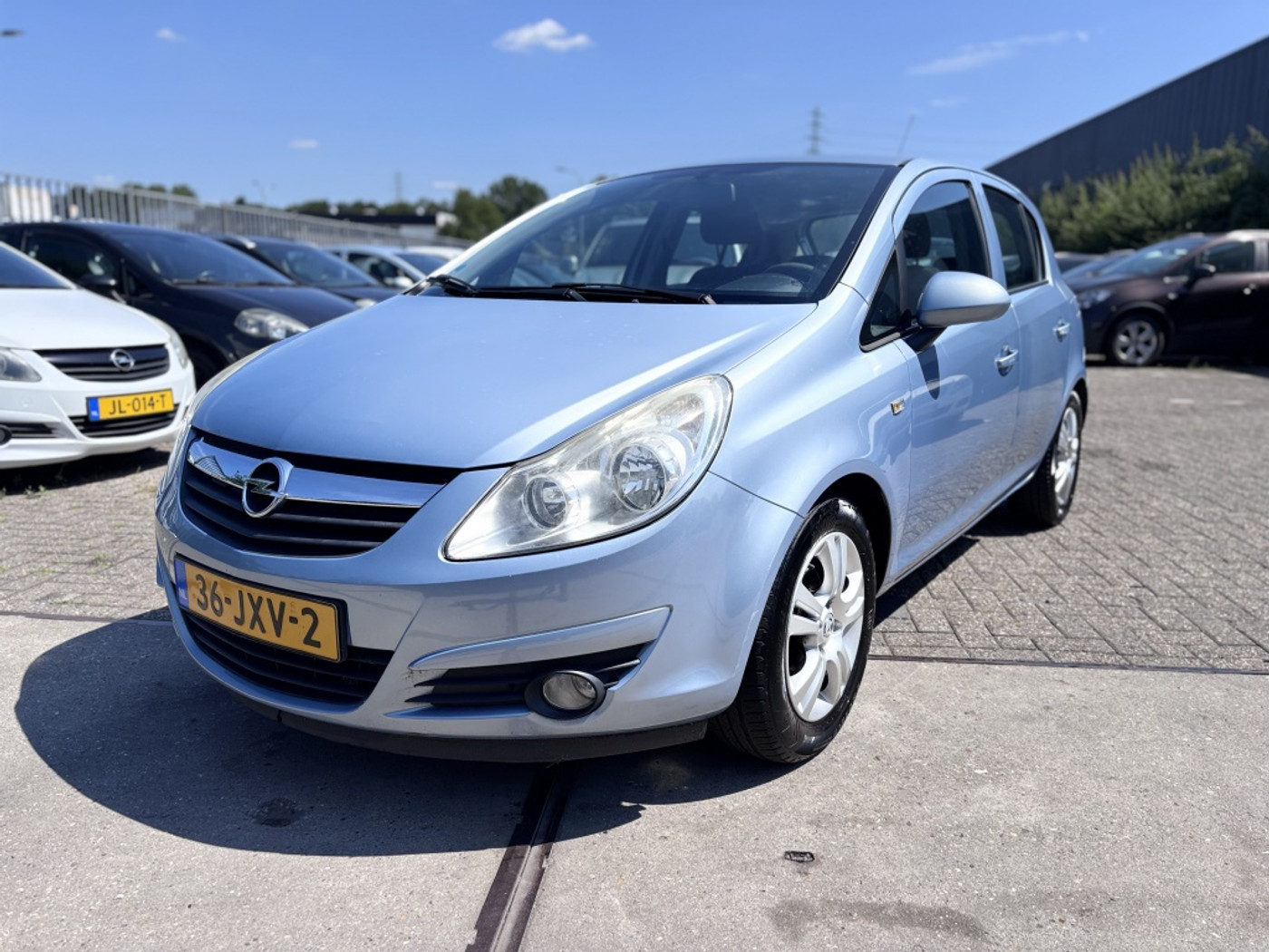 Opel Corsa 1.4-16V Enjoy 2009 - voorkant