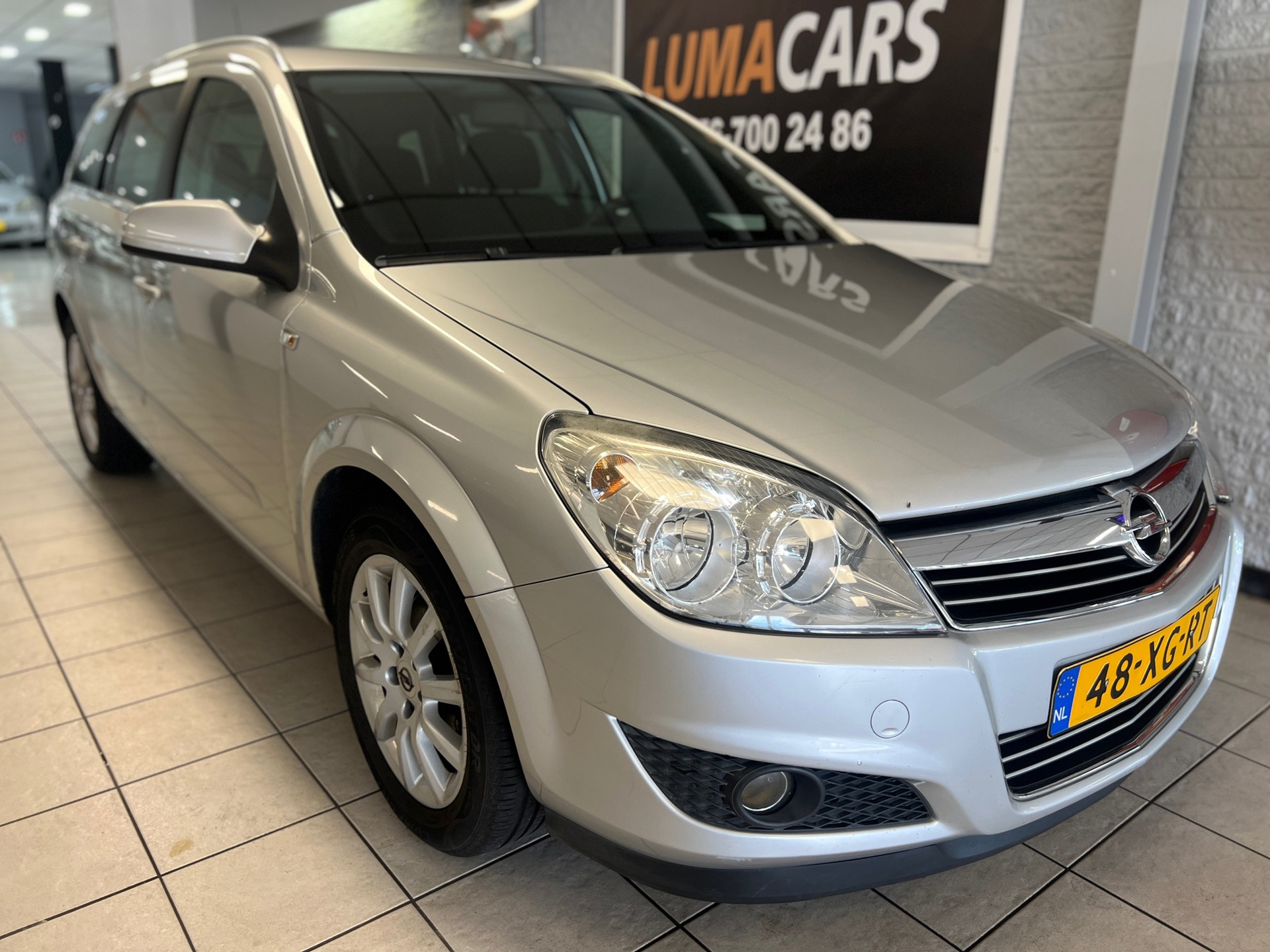 Opel Astra Station Wagon 1.6 Temptation | Nieuwe APK | Cruise | 2007 - voorkant