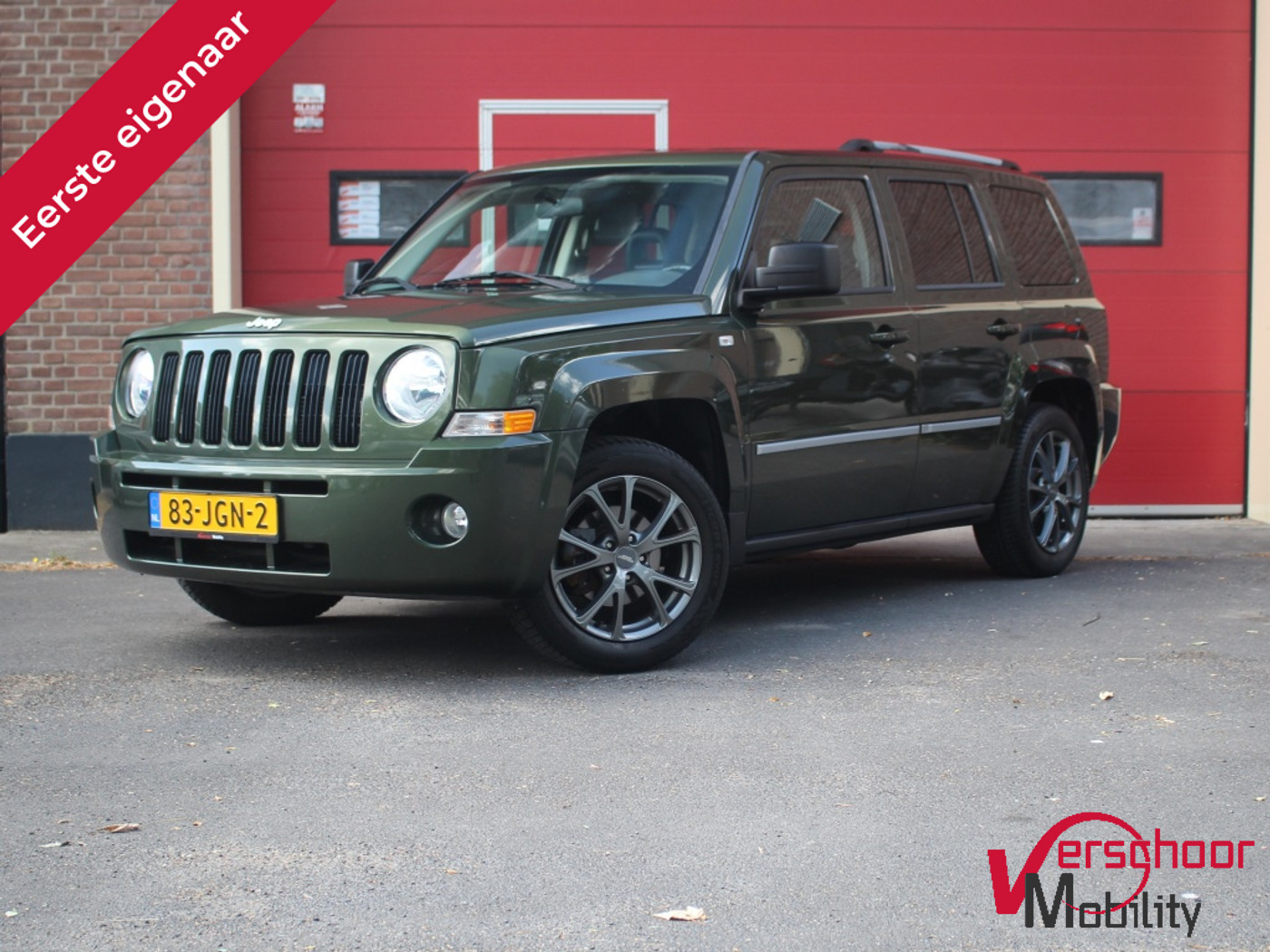 Jeep Patriot 2.4 Ltd Liberty | Cruise | Leder | Stoelverwarming | Navi | Multimedia 2009 - voorkant