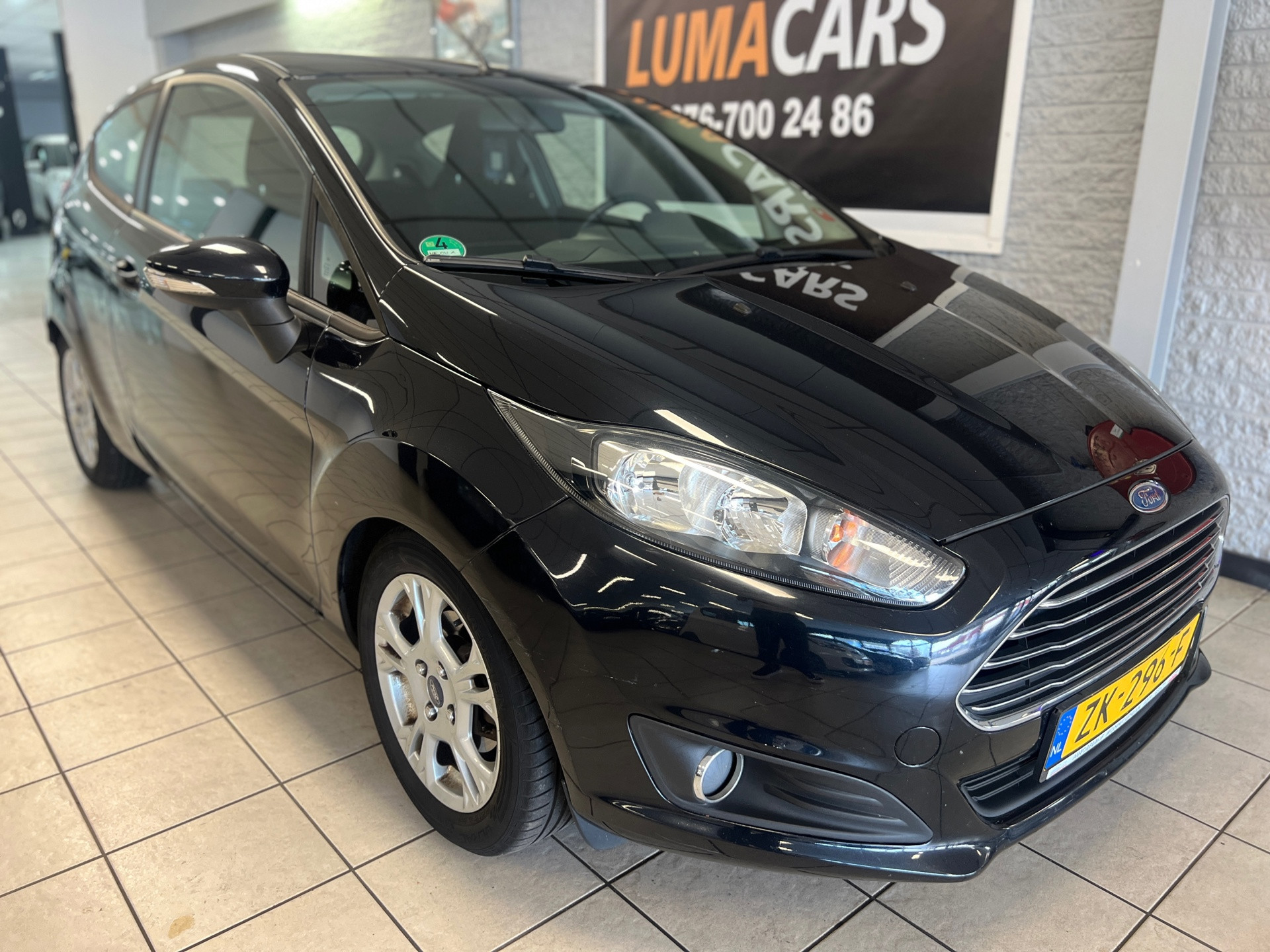 Ford Fiesta 1.0 EcoBoost Titanium | Airco | LM Velgen | 2013 - voorkant