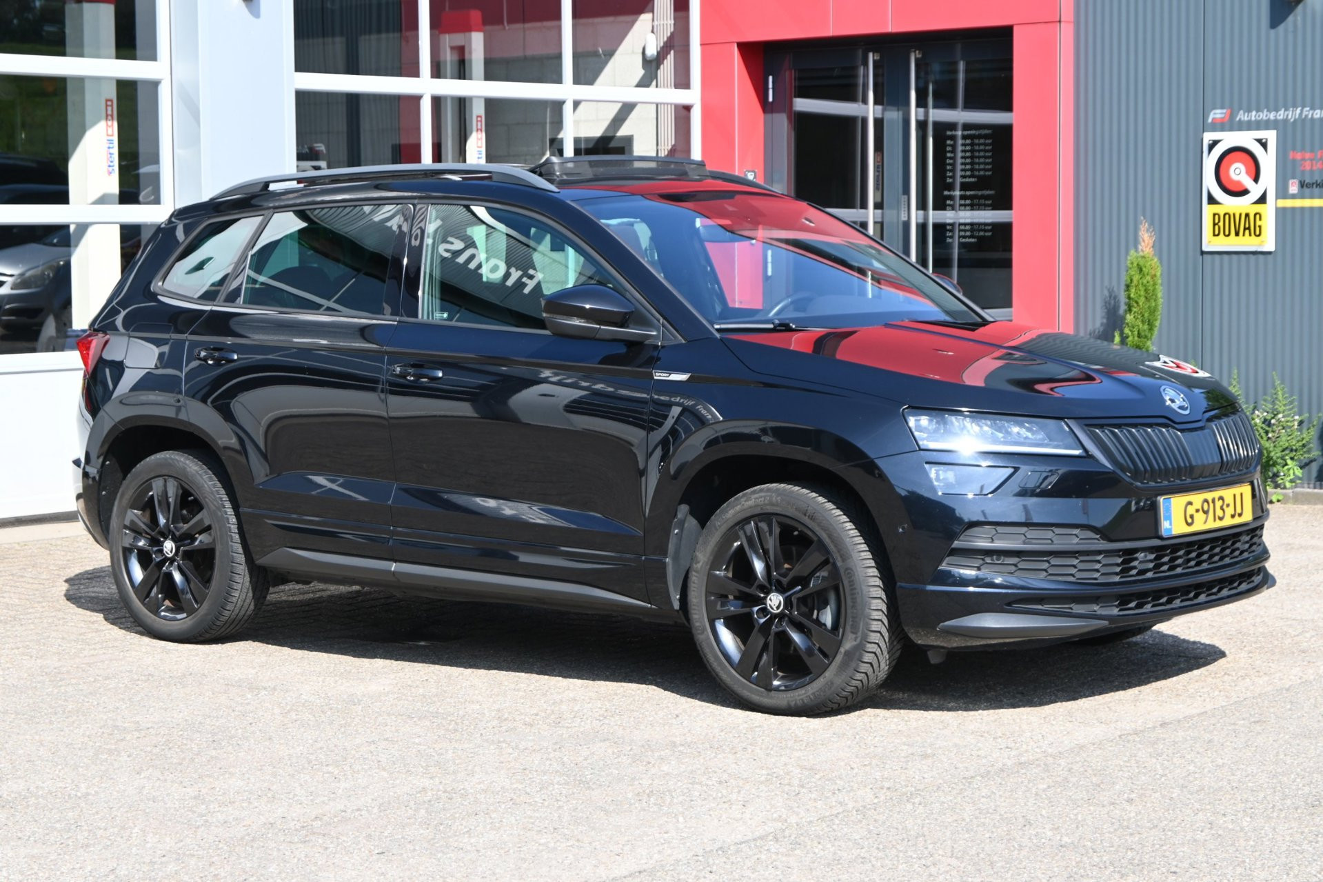 Skoda Karoq 1.5 TSI 150pk ACT Sportline Business | Panodak schuif/-kanteldak | Apple CarPlay 2019 - voorkant
