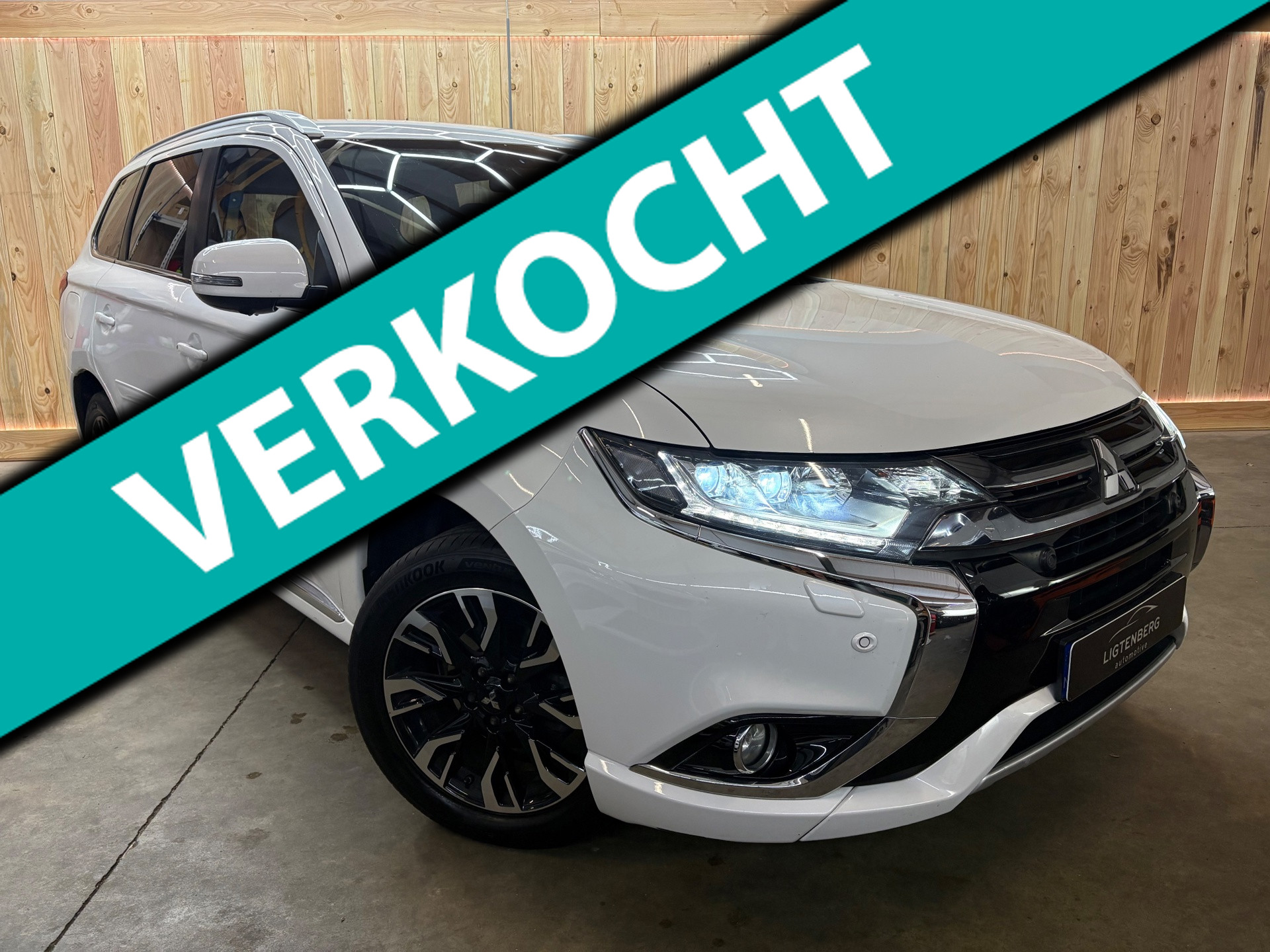 Mitsubishi Mitsubishi Outlander 2.0 PHEV instyle 4x4 LEER/AUTOMAAT/NAP 2015 - voorkant