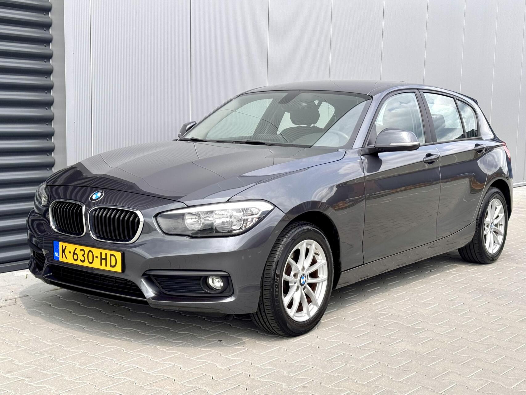 BMW 1-serie 116i Sport Facelift mod| 130.000KM | Garantie! 2015 - voorkant