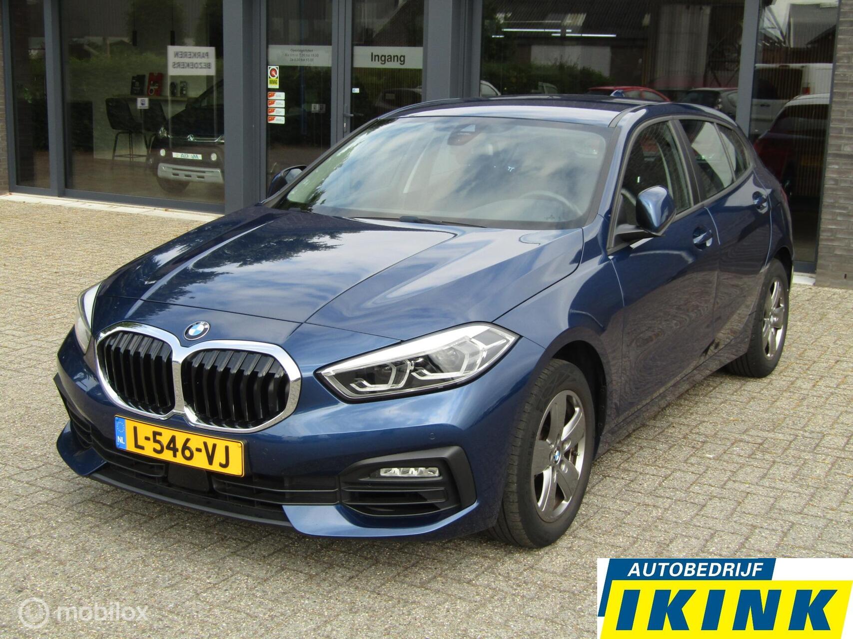 BMW 1-serie 118i High Executive | Trekhaak 2020 - voorkant