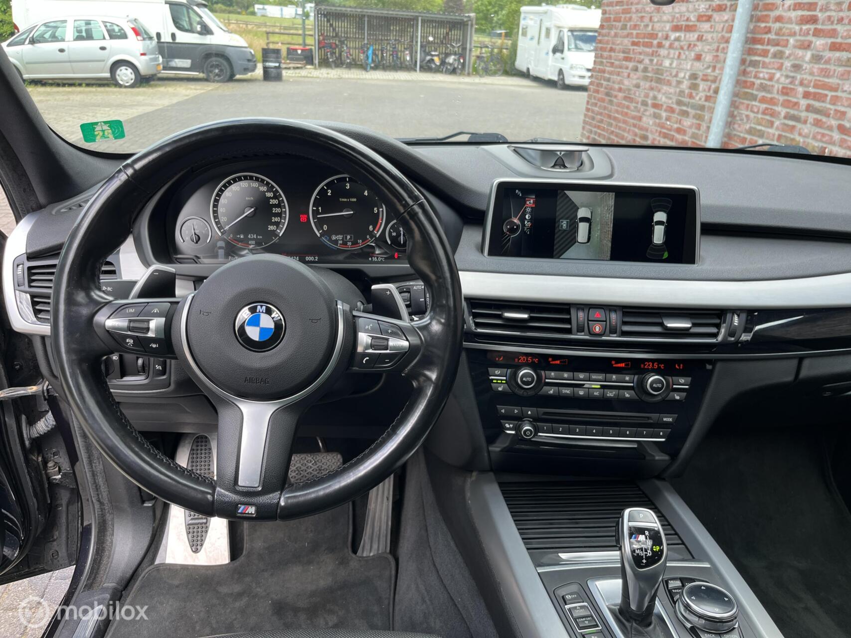 Foto van BMW X5 M50d