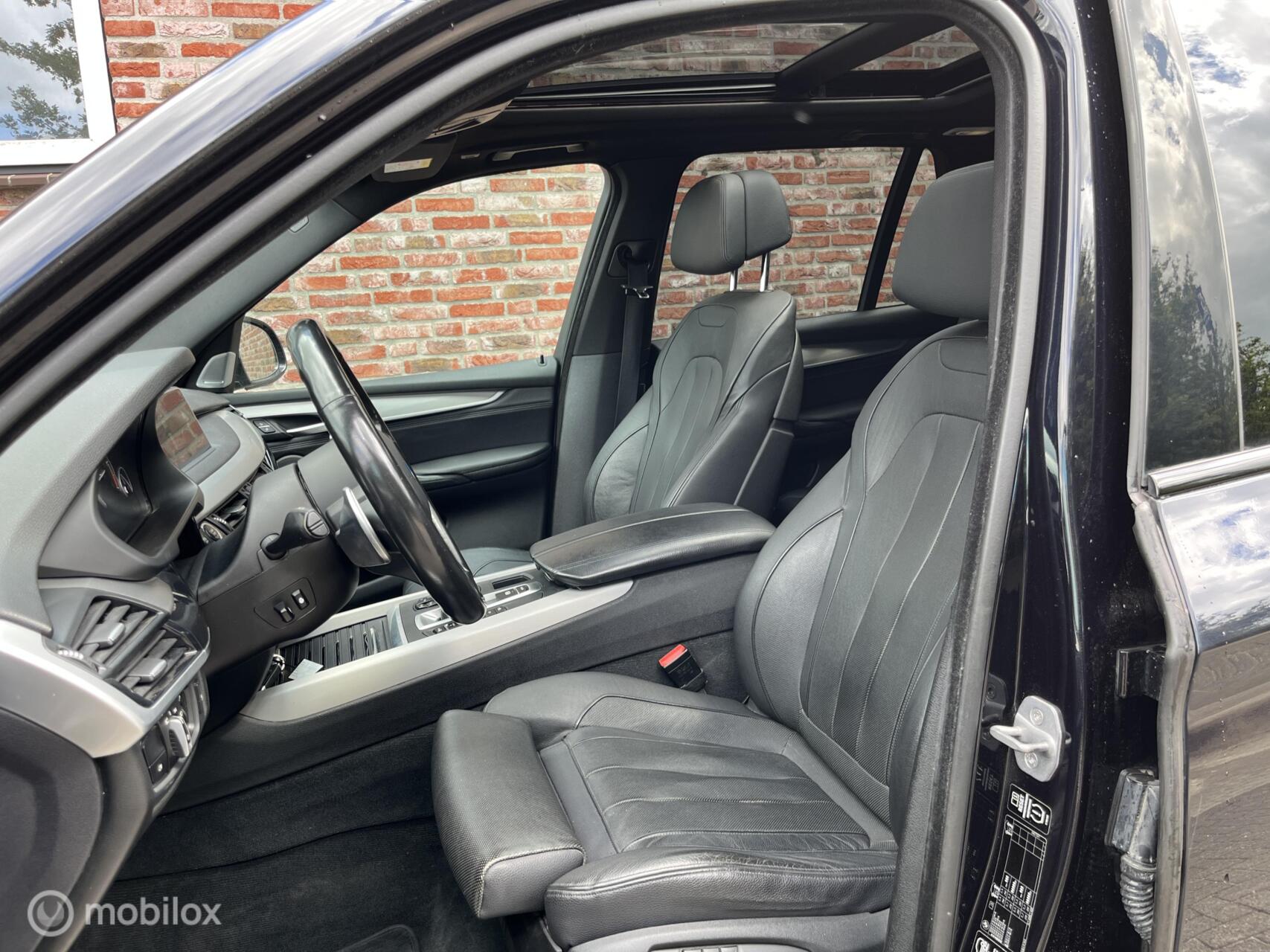 Foto van BMW X5 M50d