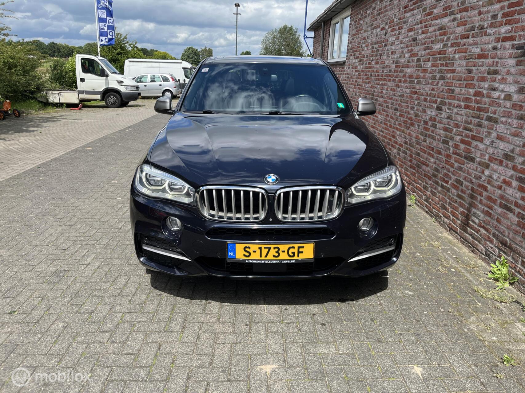 Foto van BMW X5 M50d