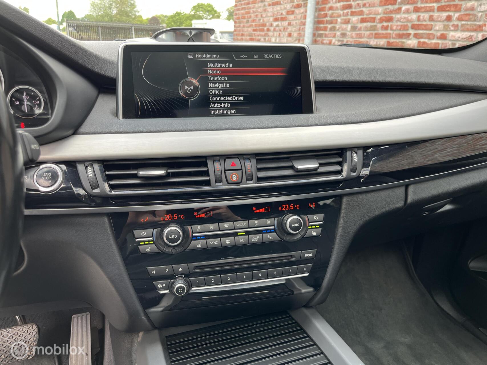 Foto van BMW X5 M50d