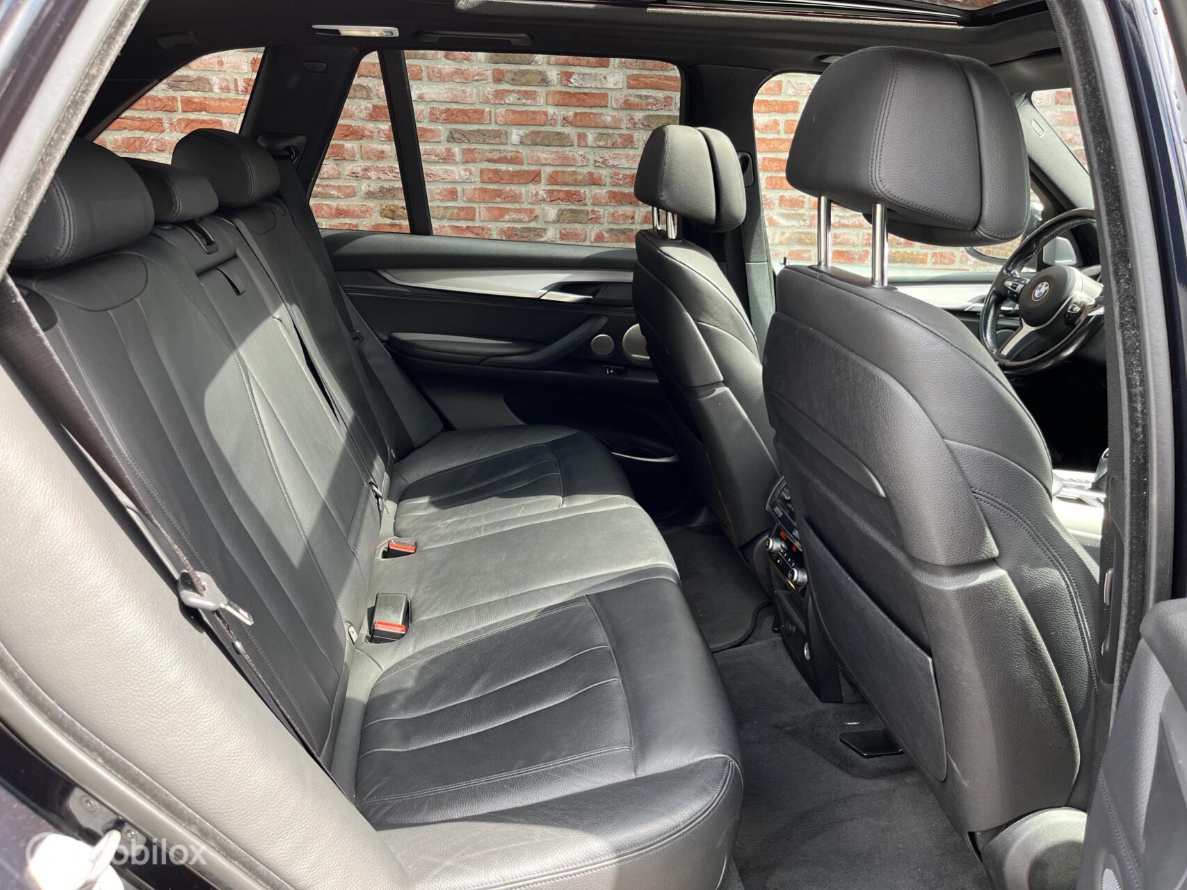 Foto van BMW X5 M50d