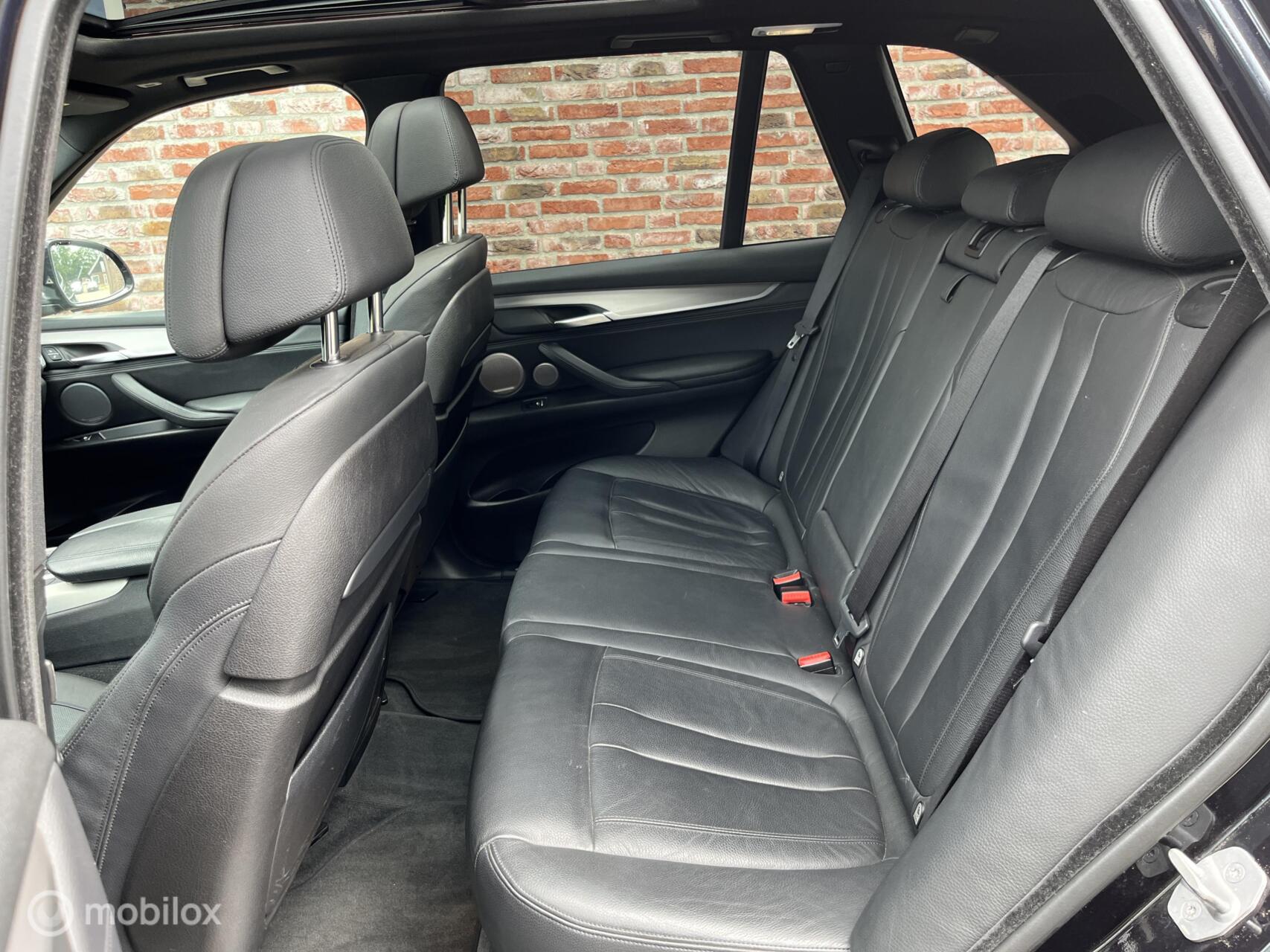 Foto van BMW X5 M50d