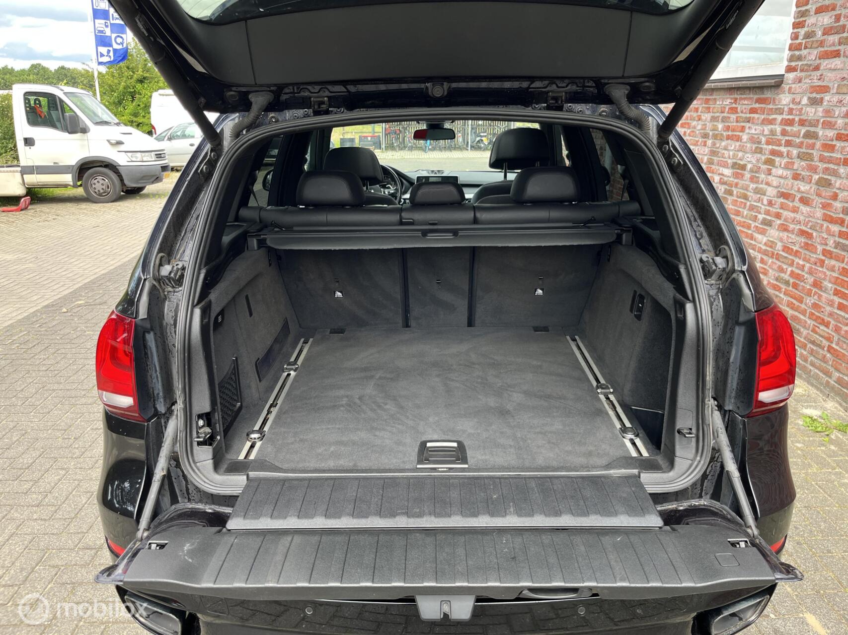 Foto van BMW X5 M50d