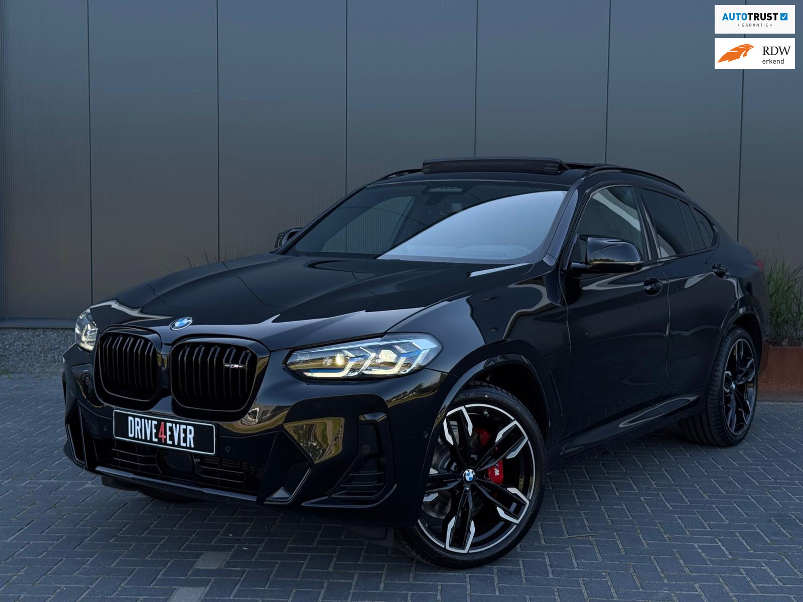 BMW X4 M40i M40i FULL CARBON | PANO | KUIPSTOELEN | 360 CAMERA | LEDER | LED | MM SEATS | NAVI | DEALER ONDERHOUDEN 2023 - voorkant