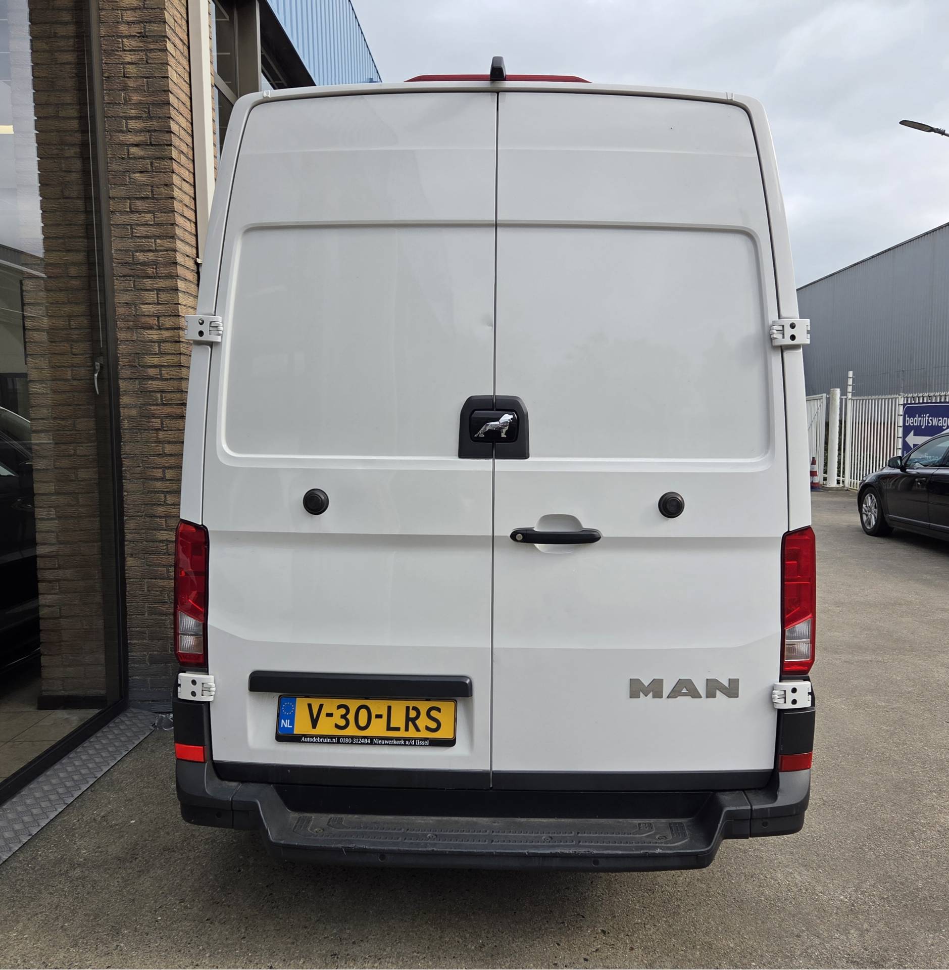 Foto van Man Tge
