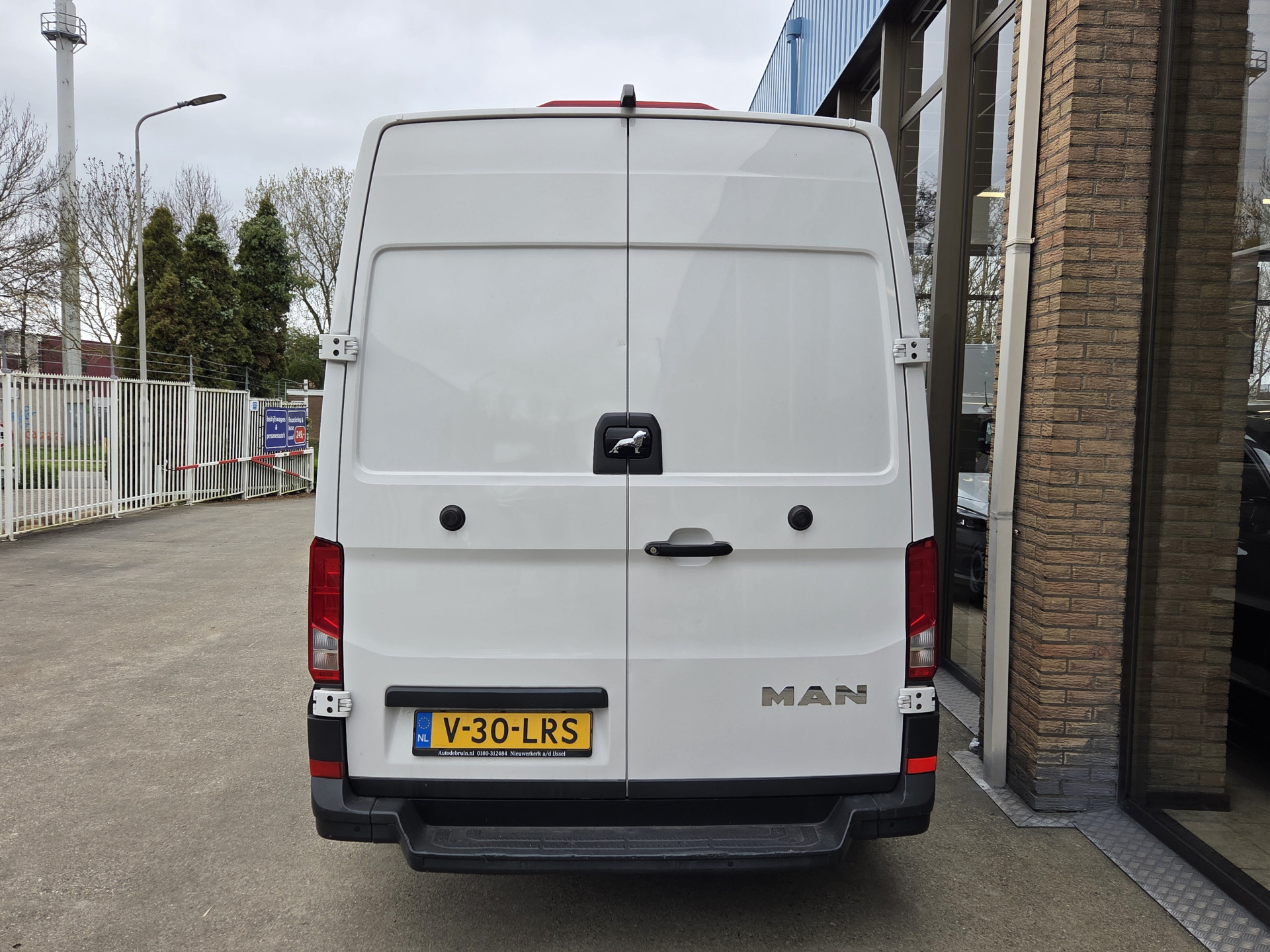 Foto van Man Tge