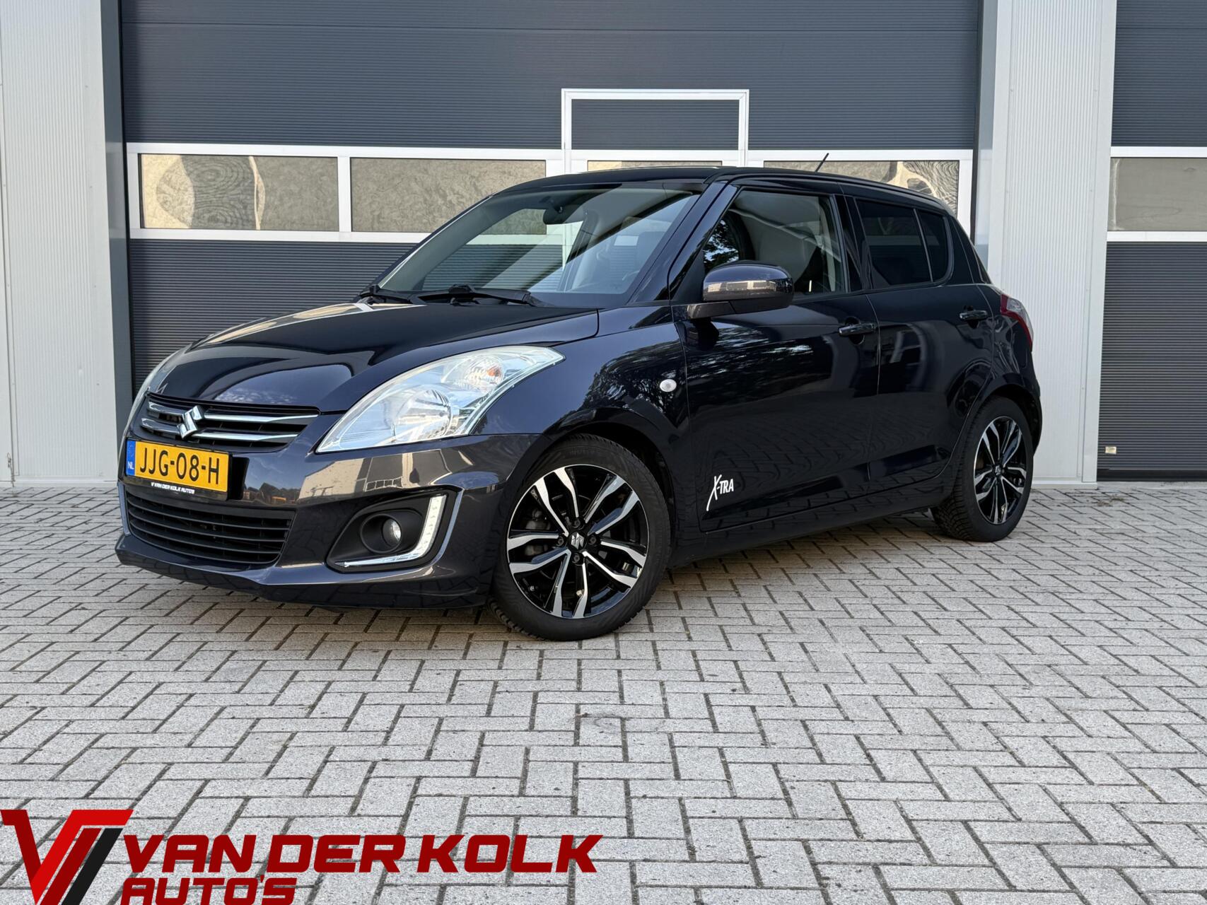 Suzuki Swift 1.2 Exclusive EASSS | CarPlay | LED | Navigatie | Cruise | Lichtmetaal | Stoelverwarming | Airco 2015 - voorkant