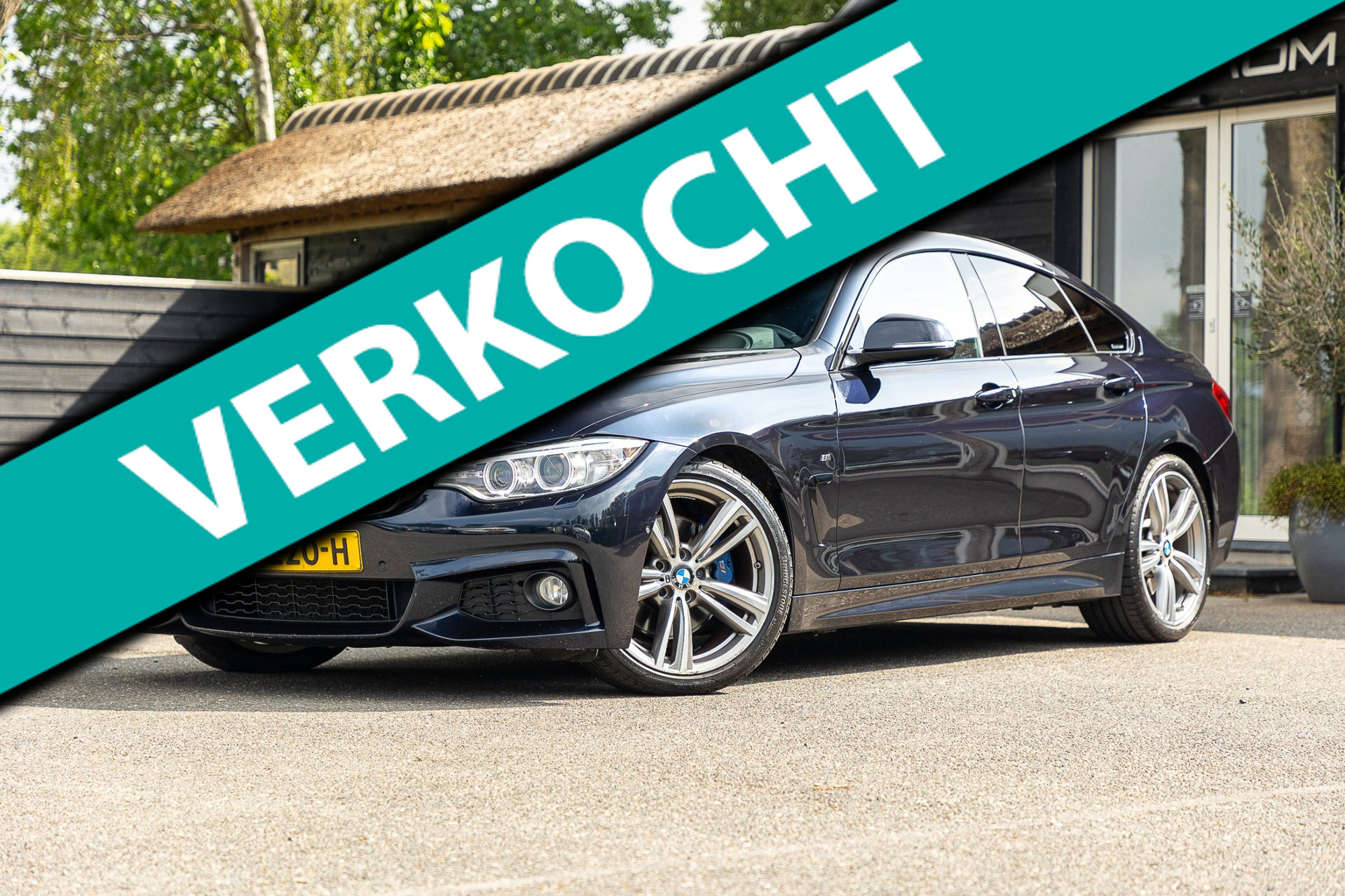 BMW 420i 420i M-Pakket I Carbonschwarz metallic I NL Auto I Dealeronderhouden I NAP I Open dak I Head Up 2017 - voorkant