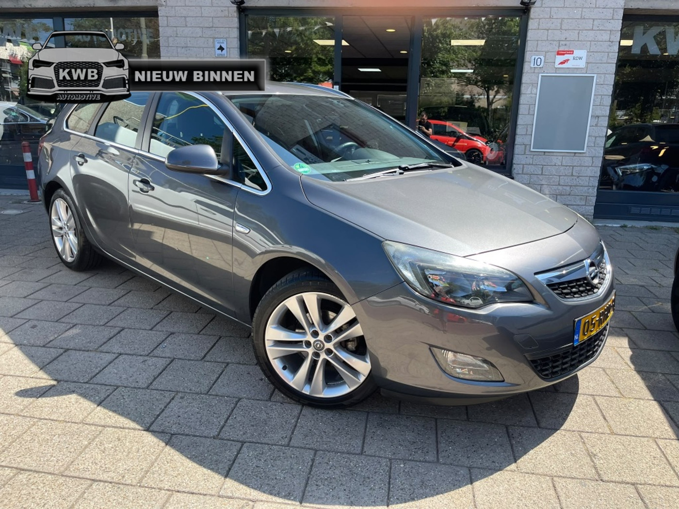 Opel Astra Sports Tourer 1.4 Turbo Sport Nieuwe apk NAP 2011 - voorkant
