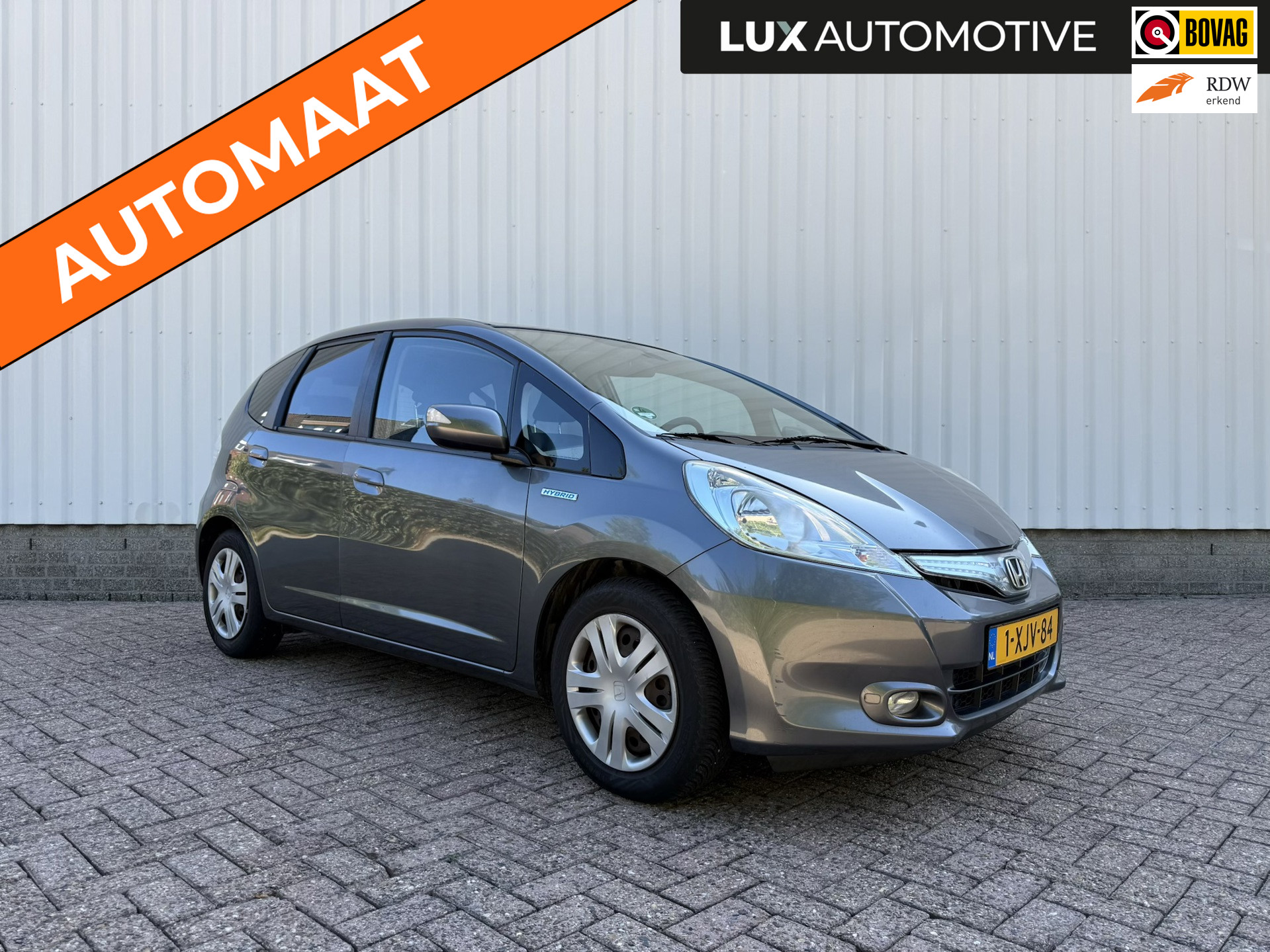 Honda Jazz Hybrid 1.4 Hybrid Elegance, Pano, Cruise, Climate Control, 4-seizoenenbanden 2014 - voorkant