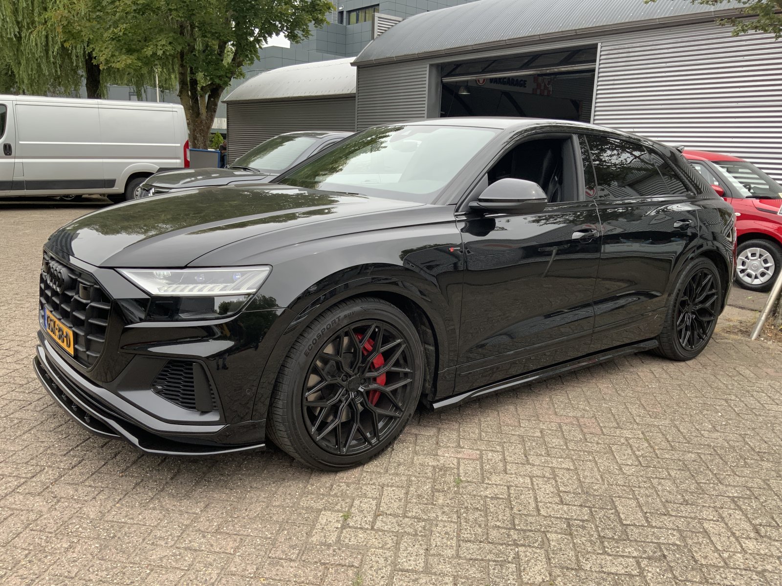 Audi Q8 55 TFSI e q ProL.Adv 2021 - voorkant