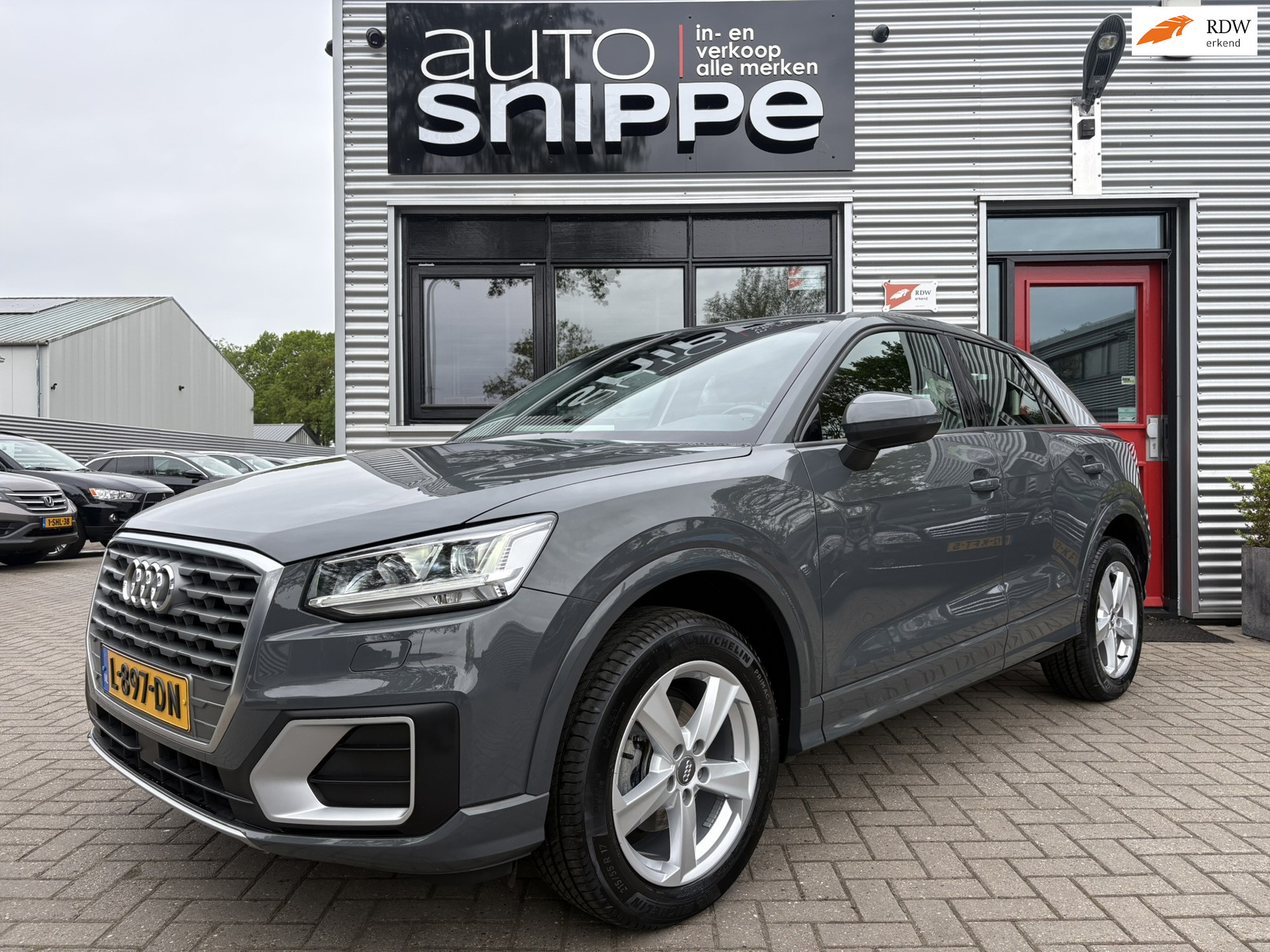 Audi Q2 35 TFSI S Edition -150 PK-AUTOMAAT-FULL LED-NARDO GREY-DAB+-STOELVERWARMING-NAVI-ISOFIX-CLIMA-CRUISECONTROL-ETC. 2020 - voorkant