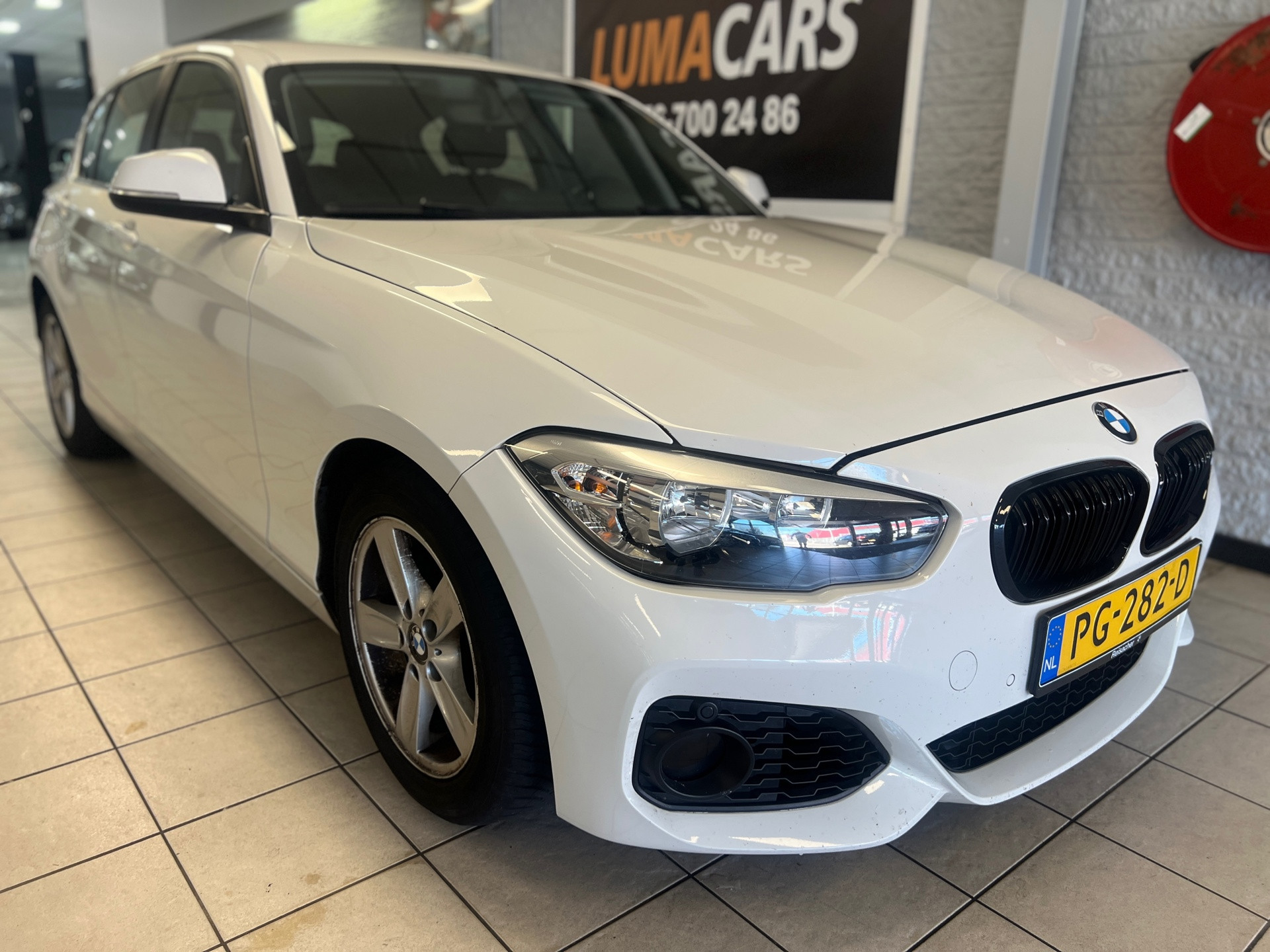 BMW 116i 116i Business | Nieuwe APK | Cruise | Automaat | 2012 - voorkant