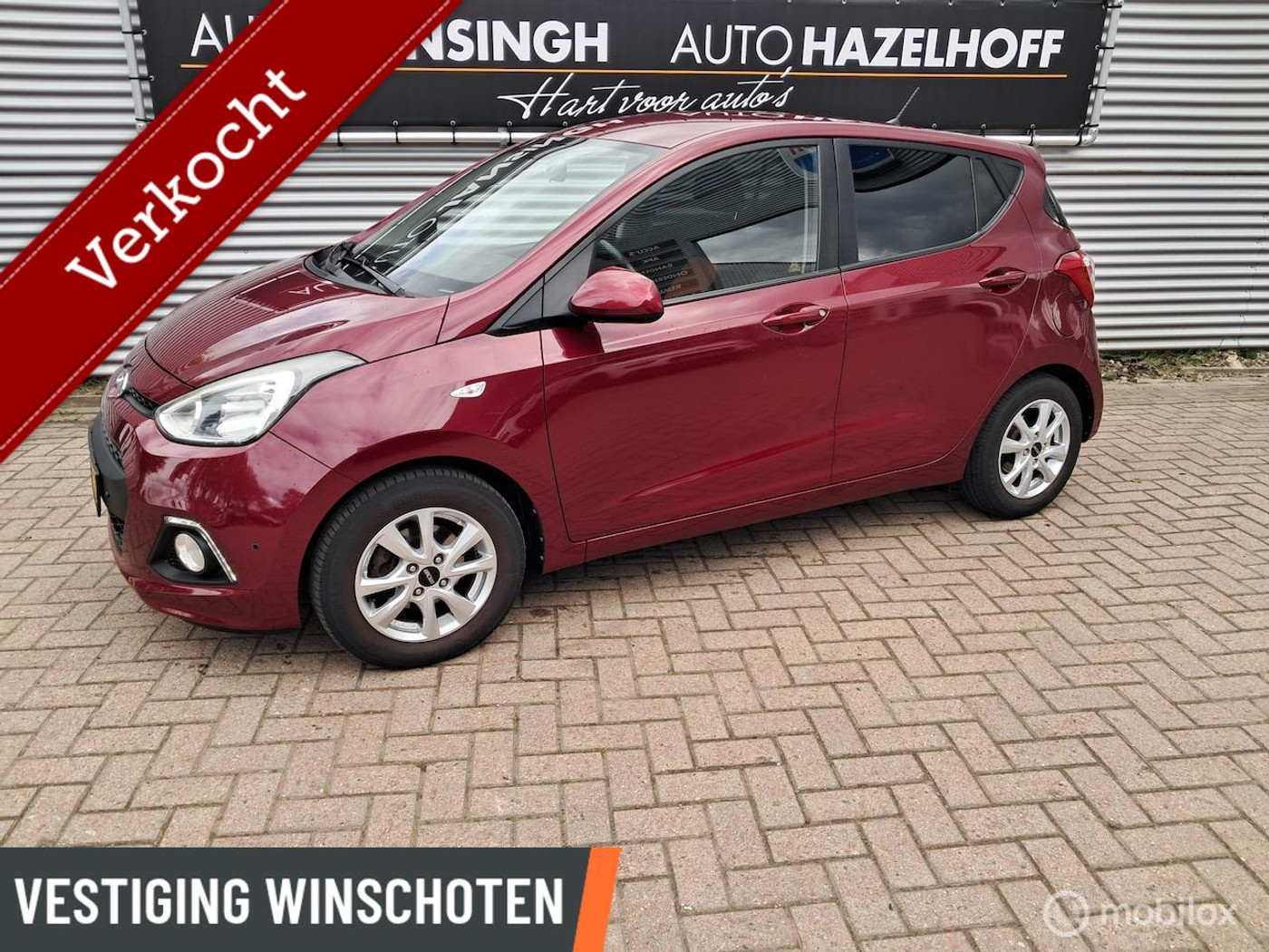 Hyundai I10 1.0i i-Motion Comfort Plus | Airco | LM Velgen | Stoel en stuurverwarming | Privacy glas | 2014 - voorkant