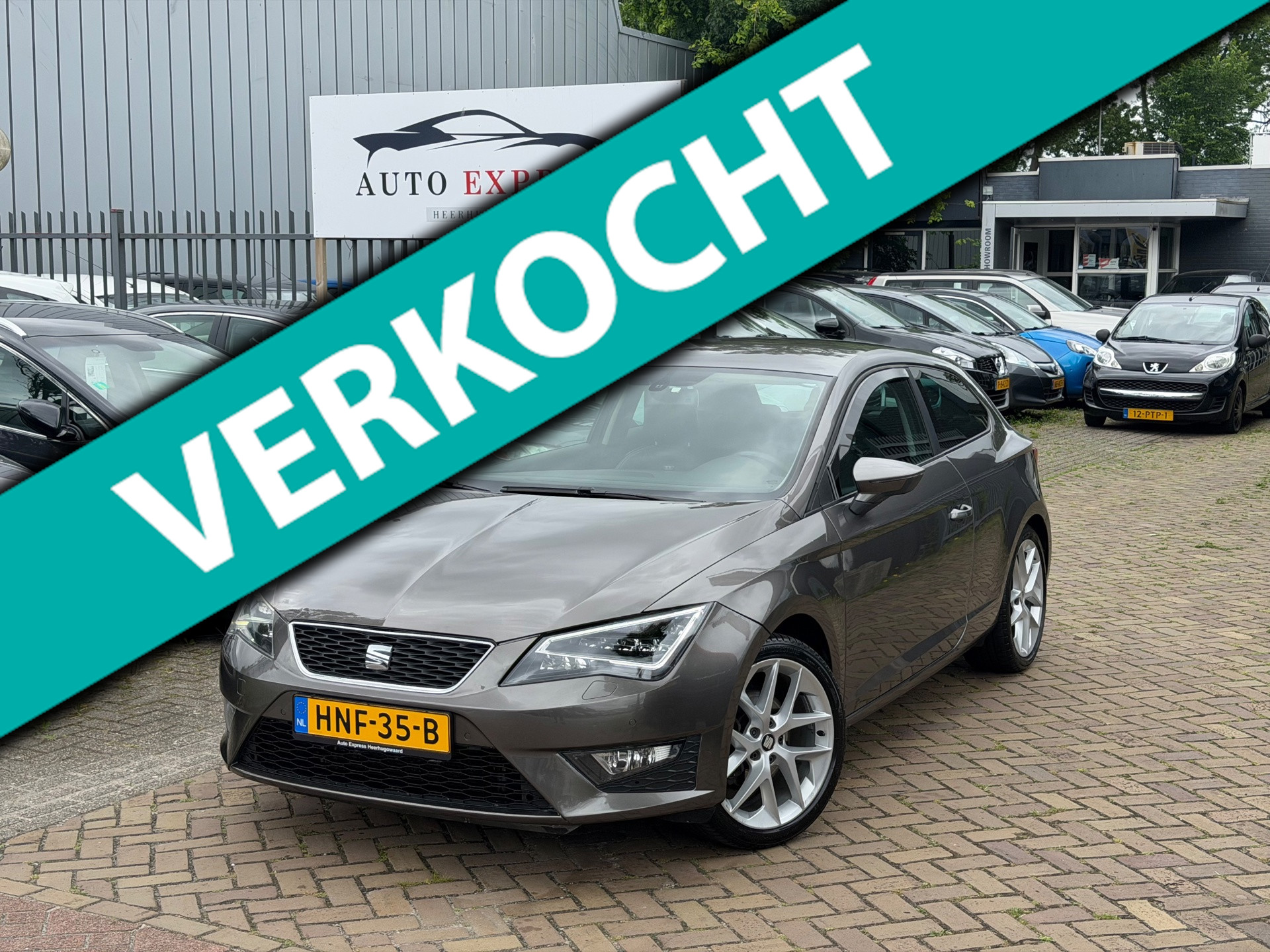 Seat Leon SC 1.4 TSI FR/Airco/Cruise/stoelverwarming/Navi/Nieuw Apk 2014 - voorkant